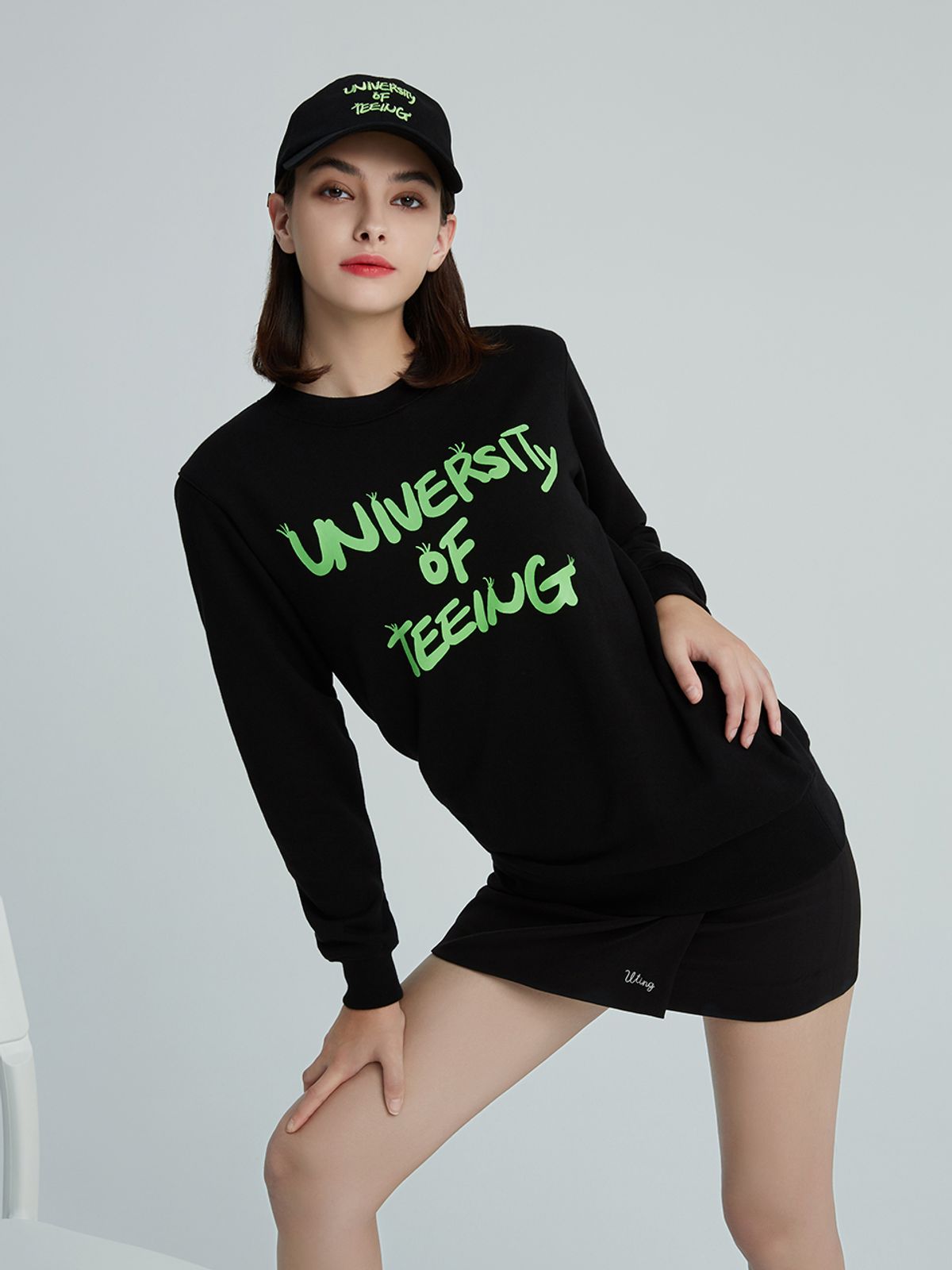 유팅골프(UTING GOLF) 네온 그래픽 스웨트셔츠 BLACK