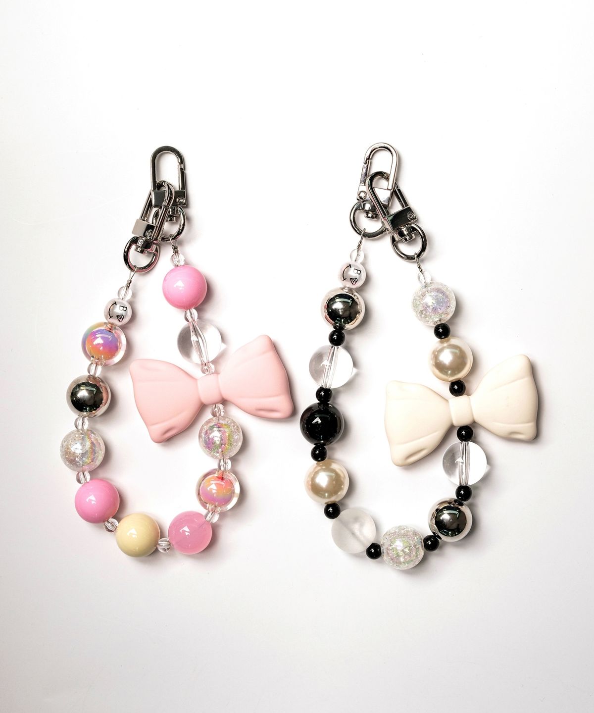 봉보(BONBEAU) Mellow big ribbon ball hand strap 봉보 멜로우 빅 리본 구슬 핸드 폰 가방 스트랩