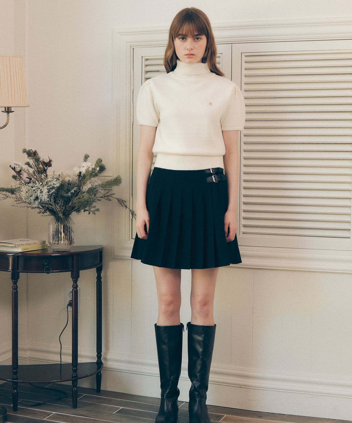 로라로라(ROLAROLA) BUCKLE POINTED SKIRT BLACK