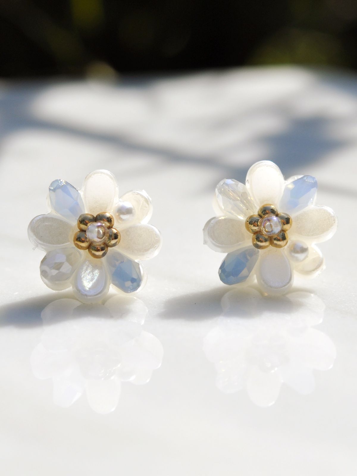 조에나(ZOENA) Baby Blue Flower Earrings