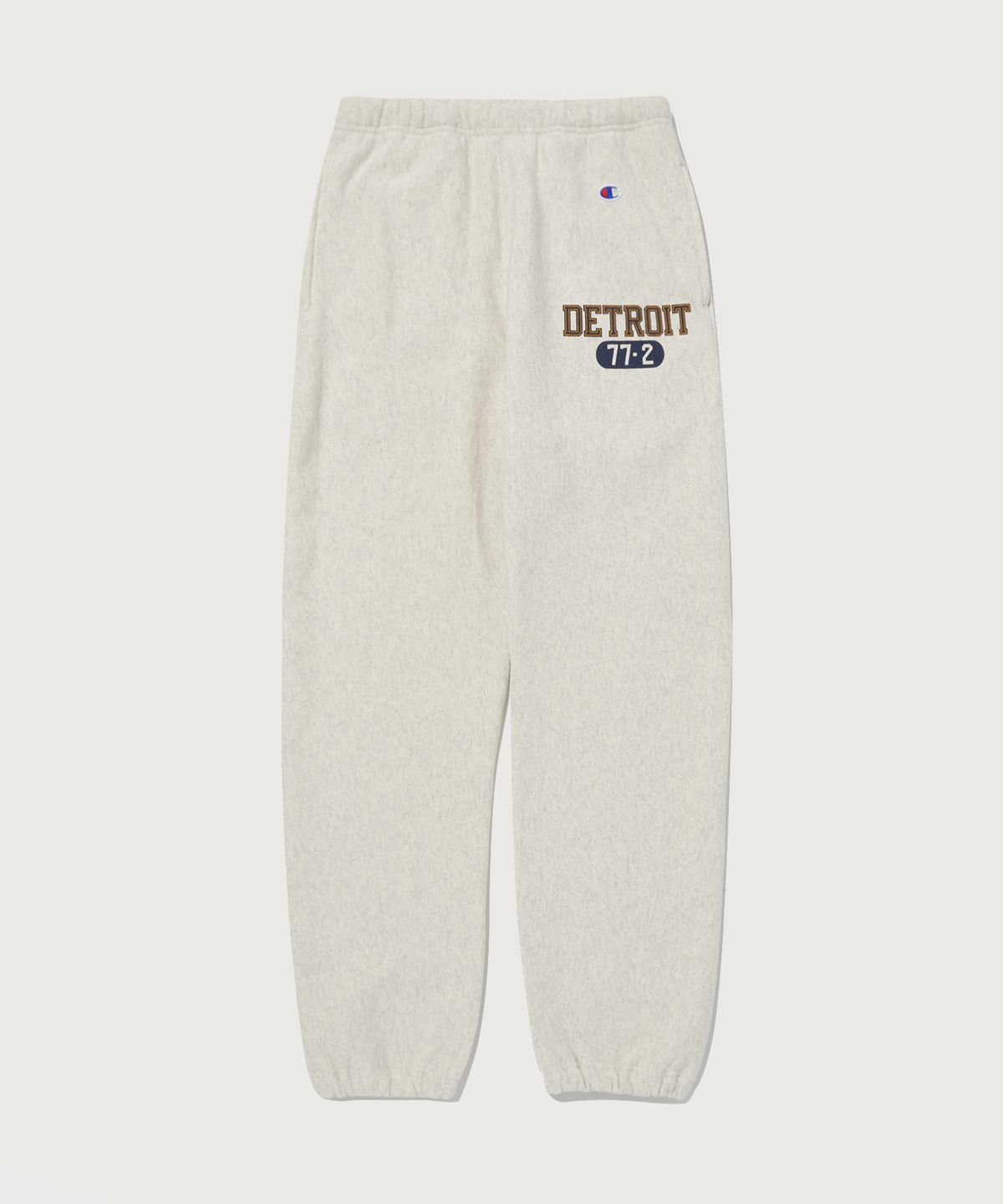 챔피온(CHAMPION) 리버스위브 블루택 기모 그래픽 루즈핏 조거 팬츠 Cream