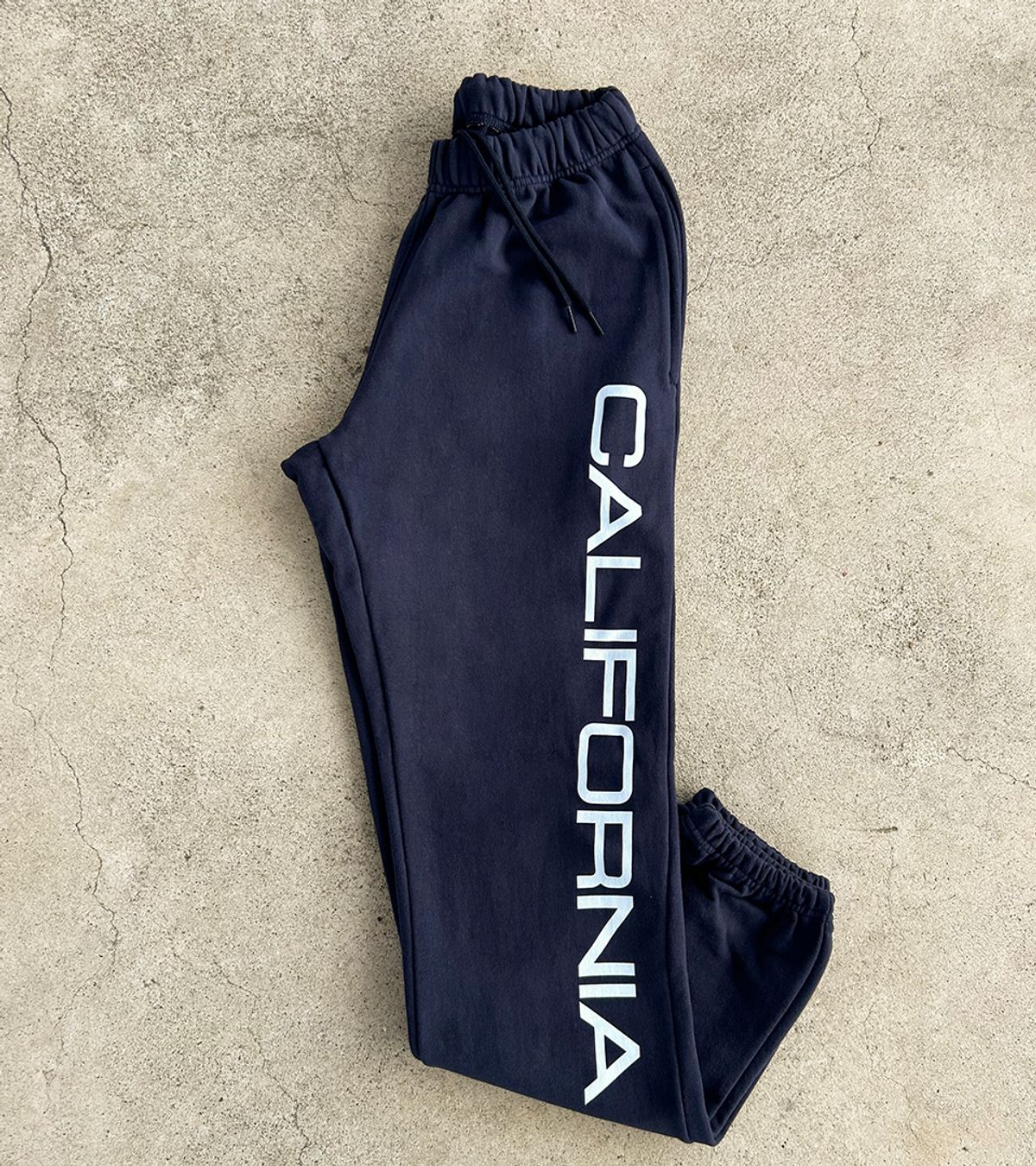 스텝온리(STAFFONLY) CALIFORNIA SWEATPANTS (NAVY)
