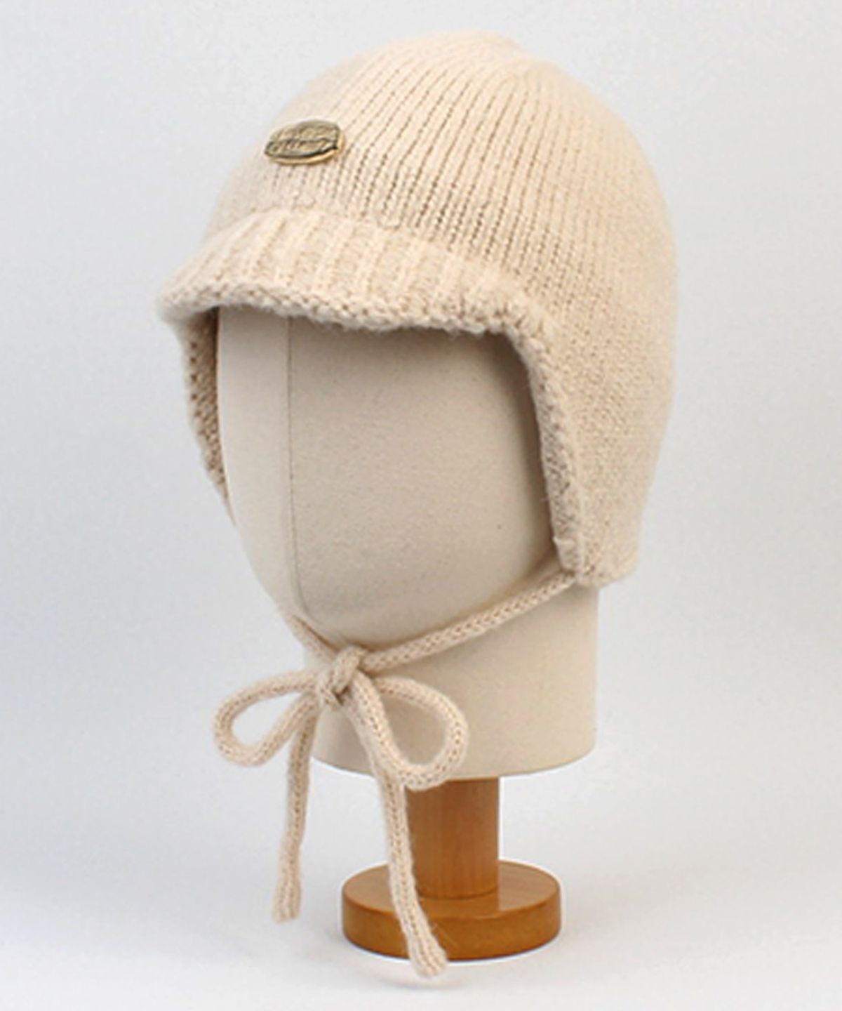 유니버셜 케미스트리(UNIVERSAL CHEMISTRY) Wool Ivory Knit Earflap Cap 니트귀달이모자