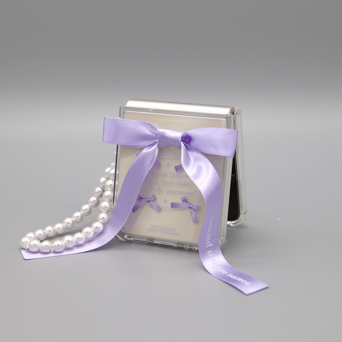 세컨드유니크네임(SECOND UNIQUE NAME) SUN CASE CLEAR BALLET RIBBON PURPLE (Z FLIP)