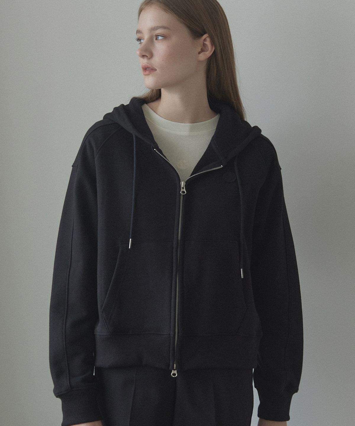 논로컬(NONLOCAL) Emblem Logo Hood Zip-Up - Black