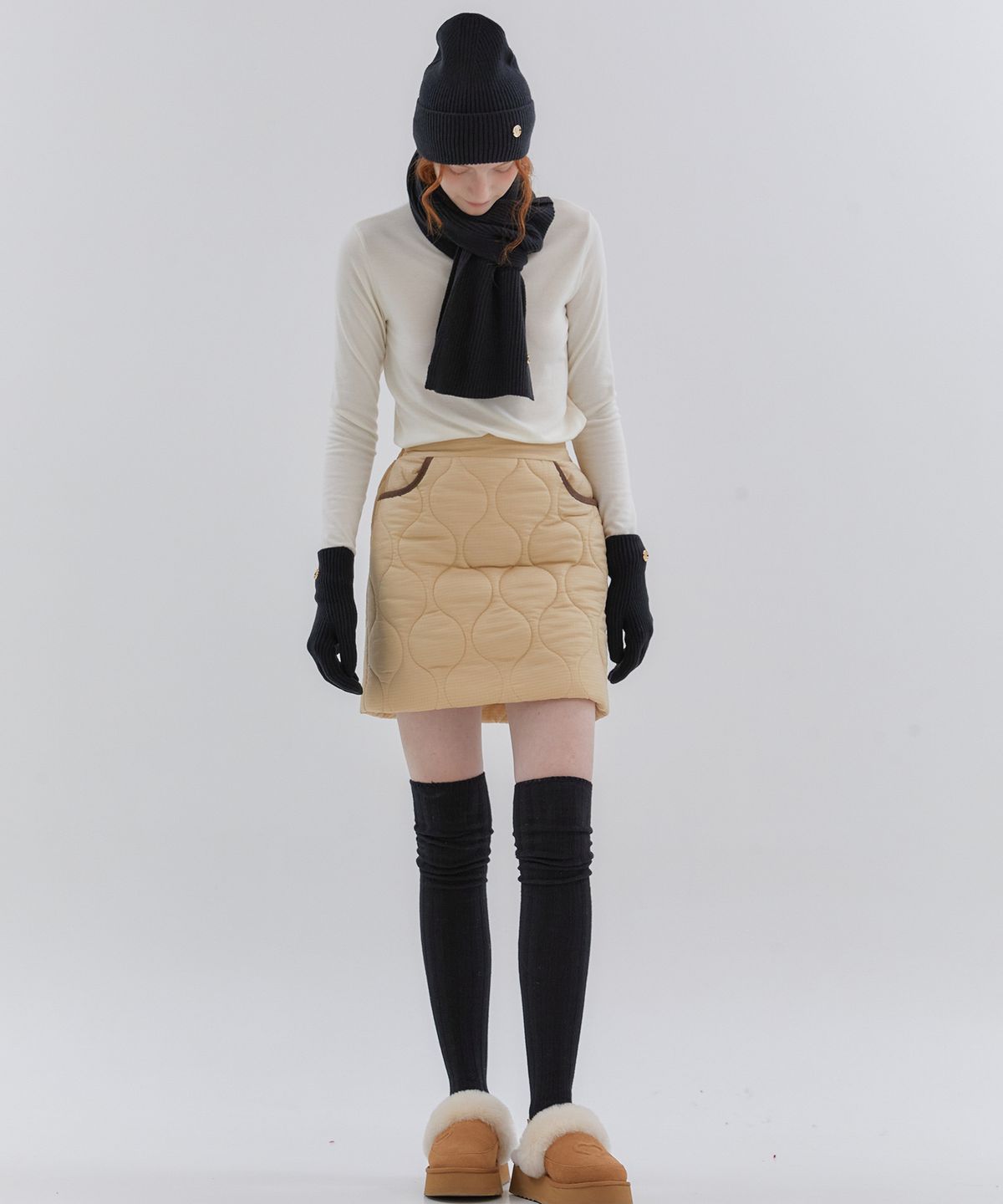 아노에틱(ANOETIC) WAVE LINE QUILTING SKIRT_BEIGE