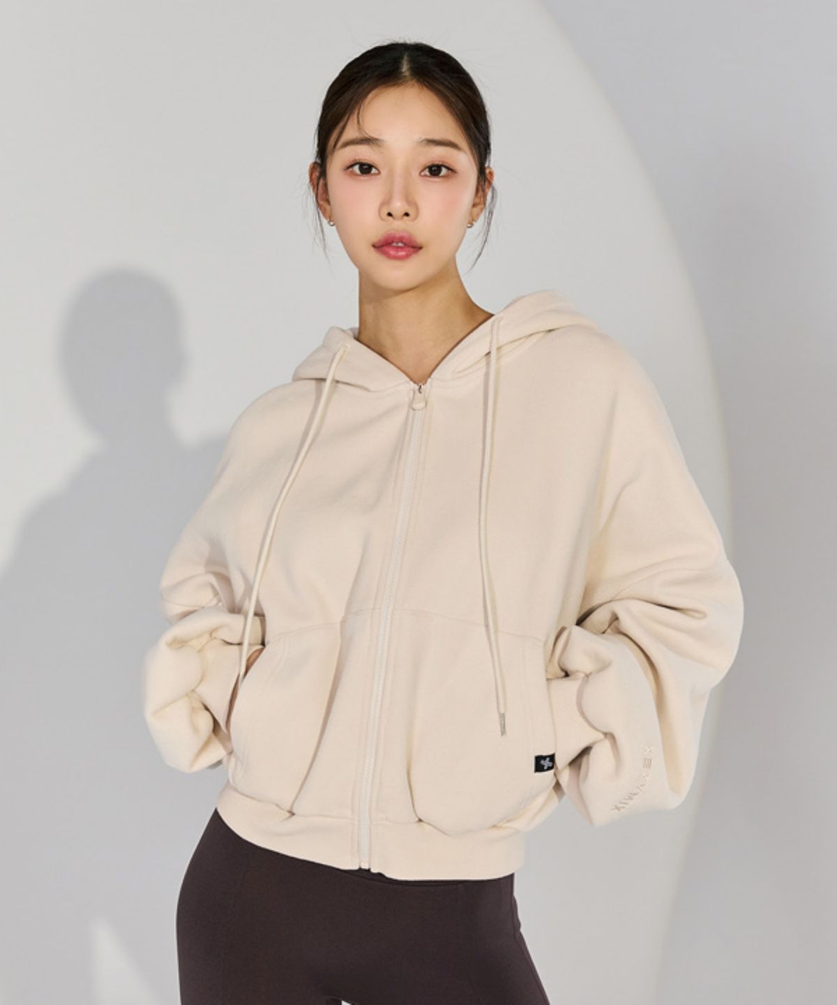 젝시믹스(XEXYMIX) 내핑 후드 집업 밀크베이지