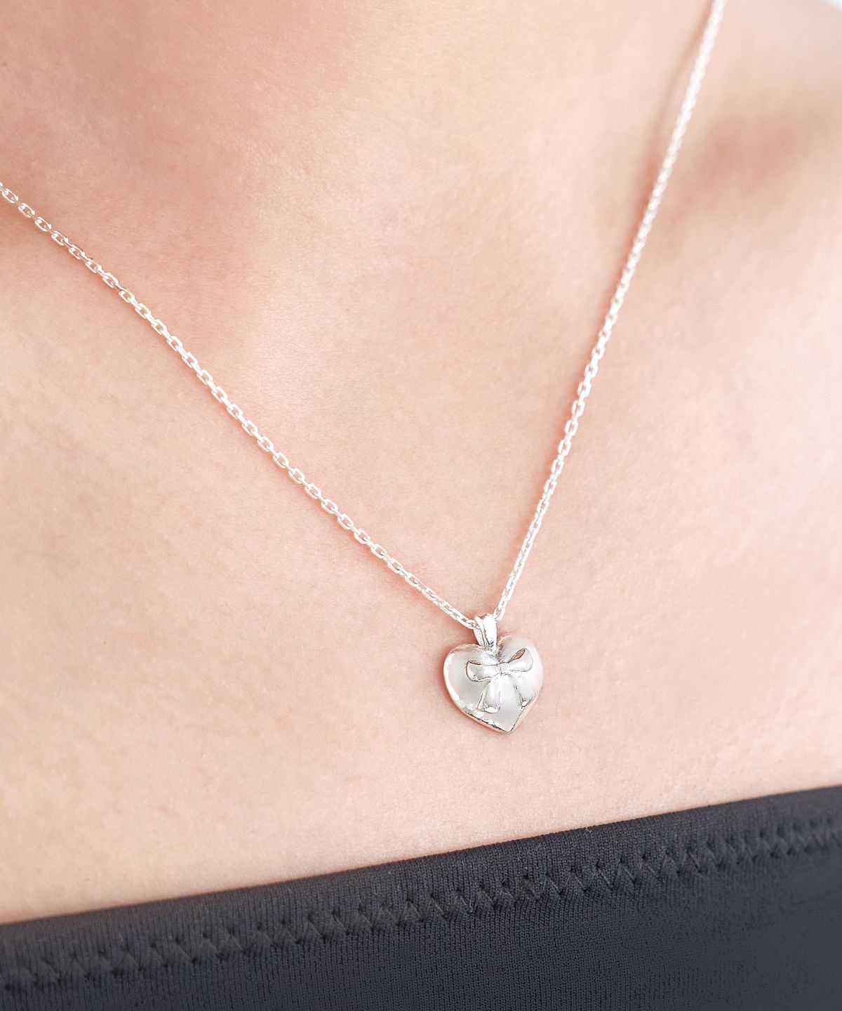 포스트루드(POSTLUDE) [SILVER] HEART RIBBON PENDANT N (2 COLORS)