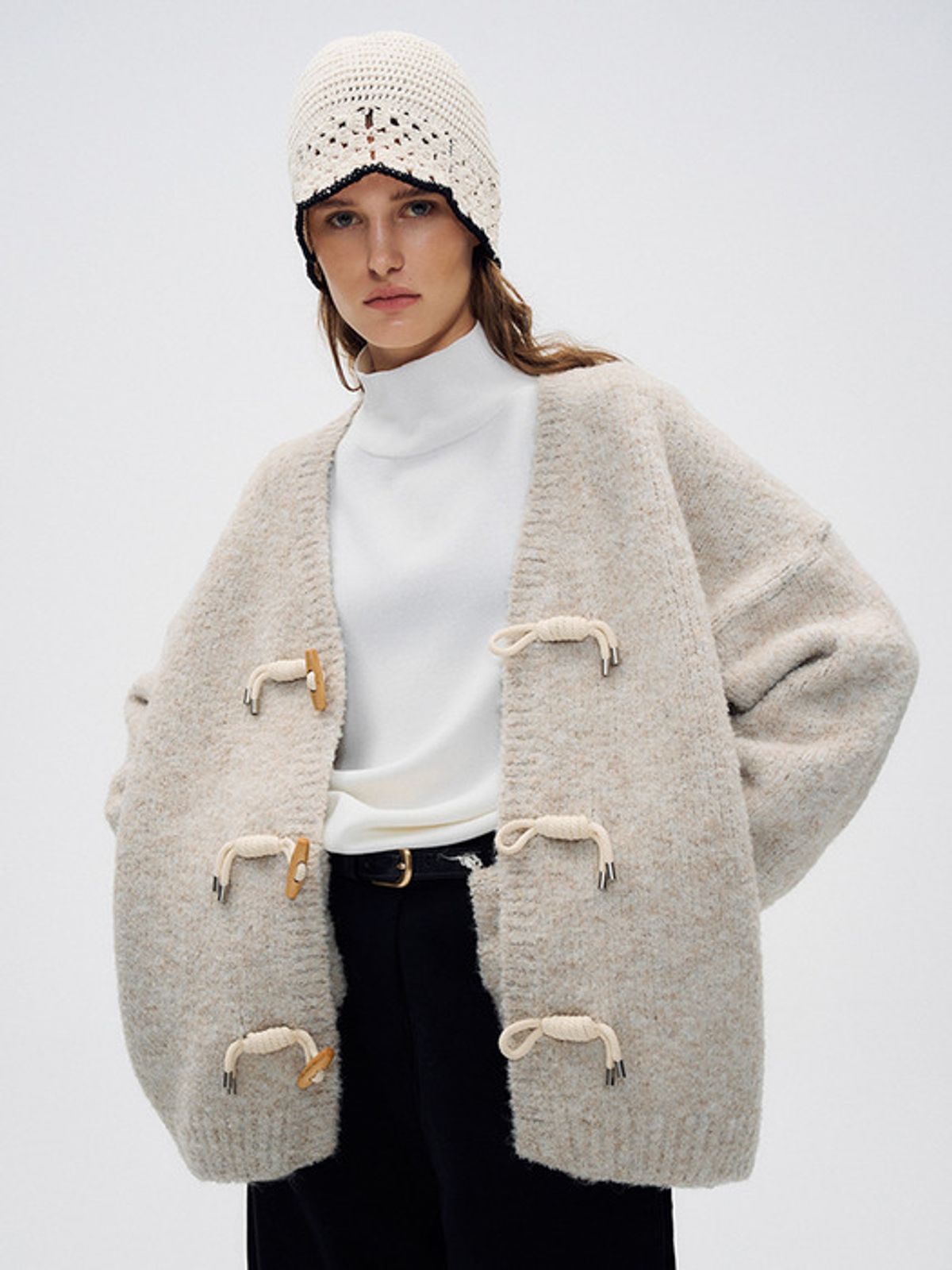 위메농(OUI MAIS NON) Woodbutton knit cardigan