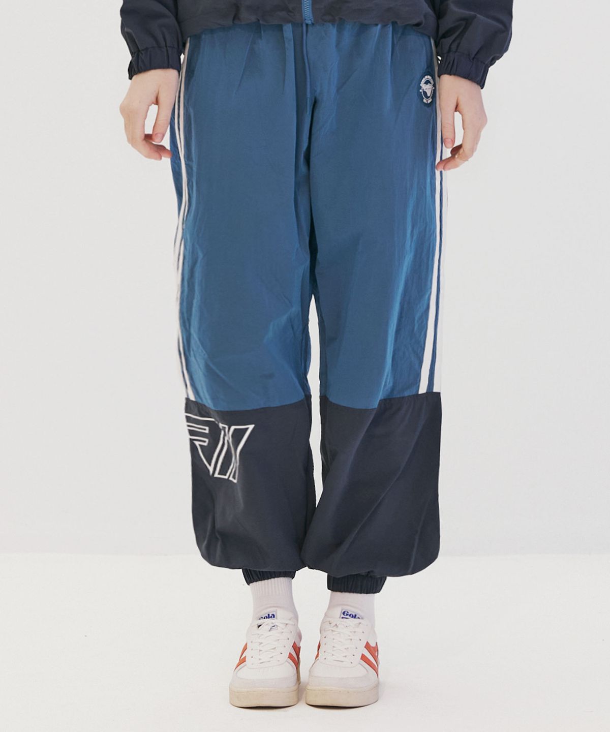 골라(GOLA) TAPE POINT NYLON JOGGER PANTS [DEEP BLUE]