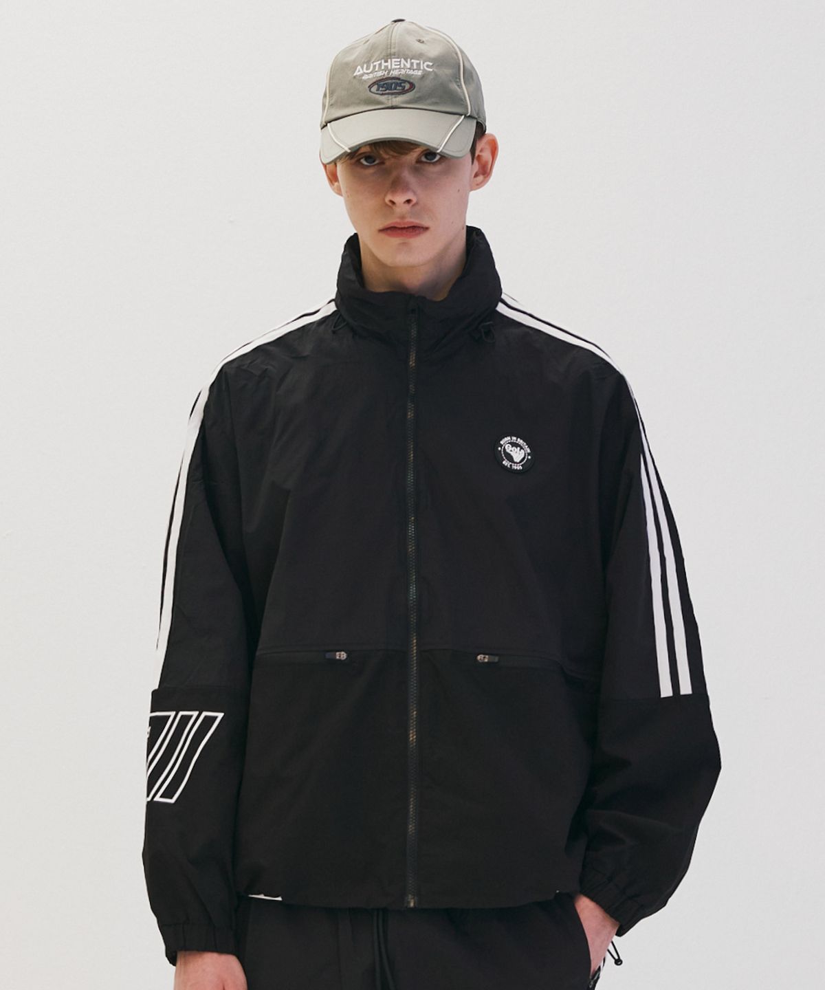 골라(GOLA) TAPE POINT NYLON JUMPER [BLACK]