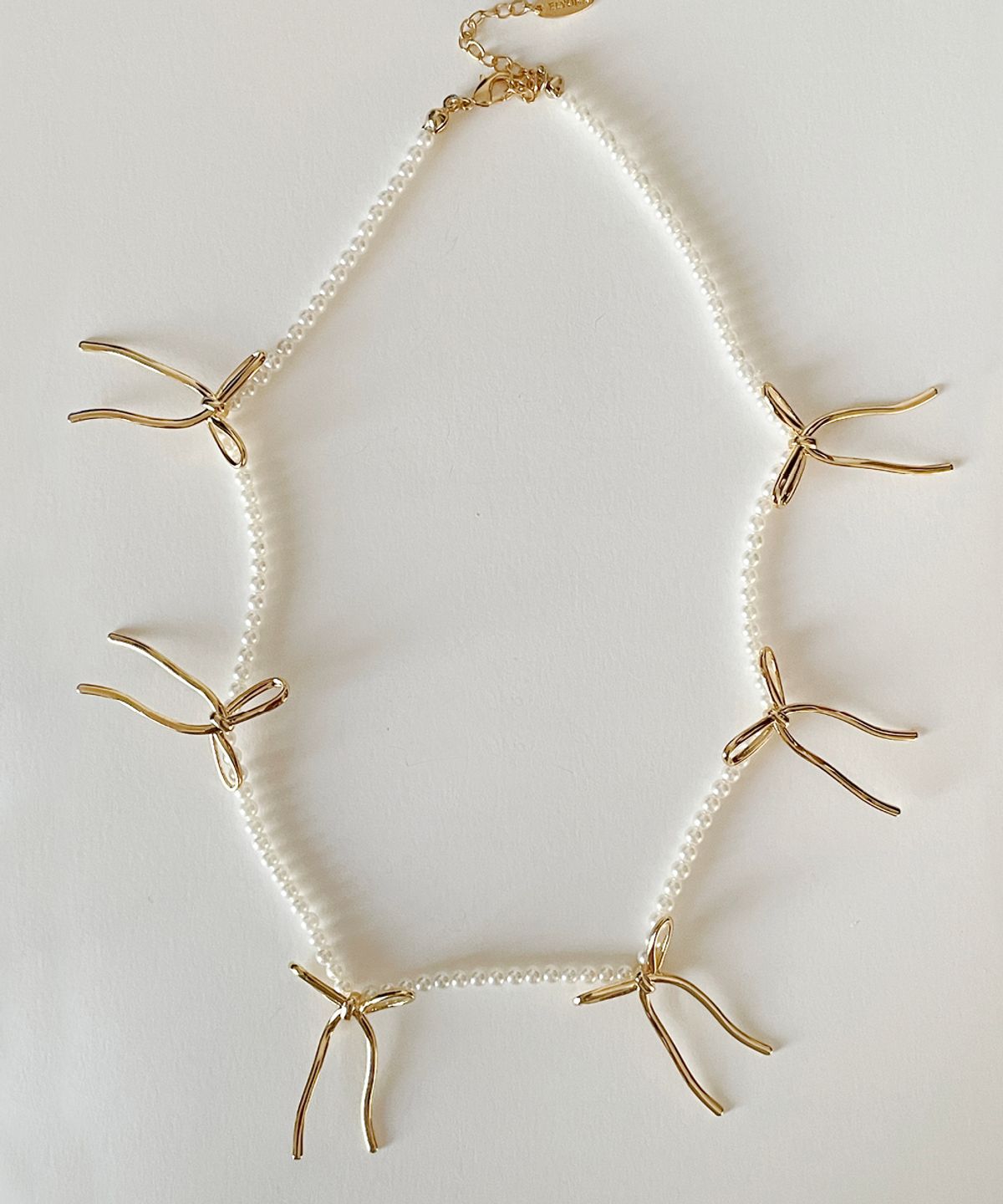 엘리오나(ELYONA) Multi Bows Pearl Necklace