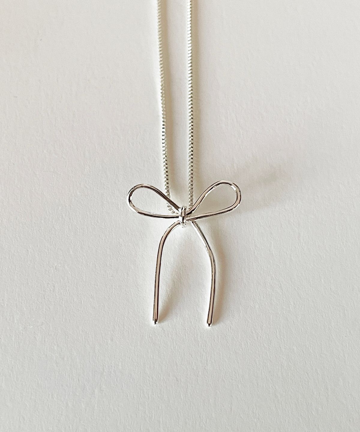 엘리오나(ELYONA) 보우 리본 목걸이 Bow Necklace (실버)