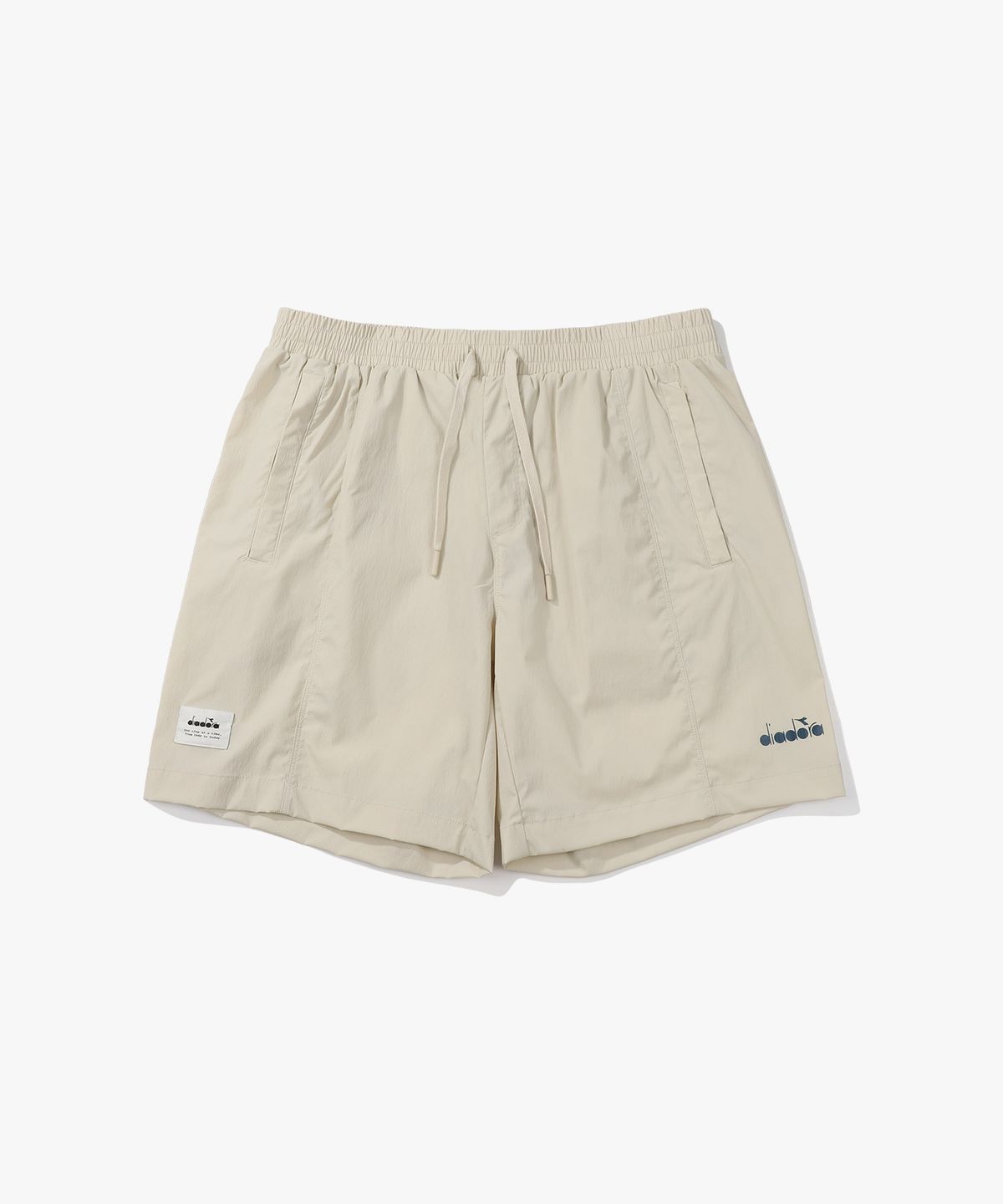 디아도라(diadora) 컴피 우븐 하프팬츠 BEIGE