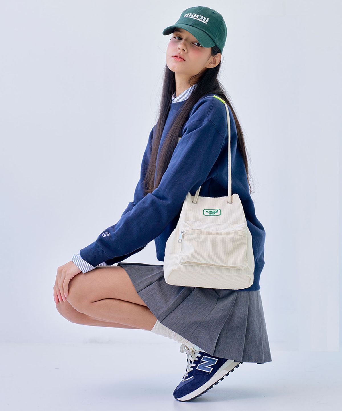 마크니(MACNI) CORDUROY STRING BAG_IVORY