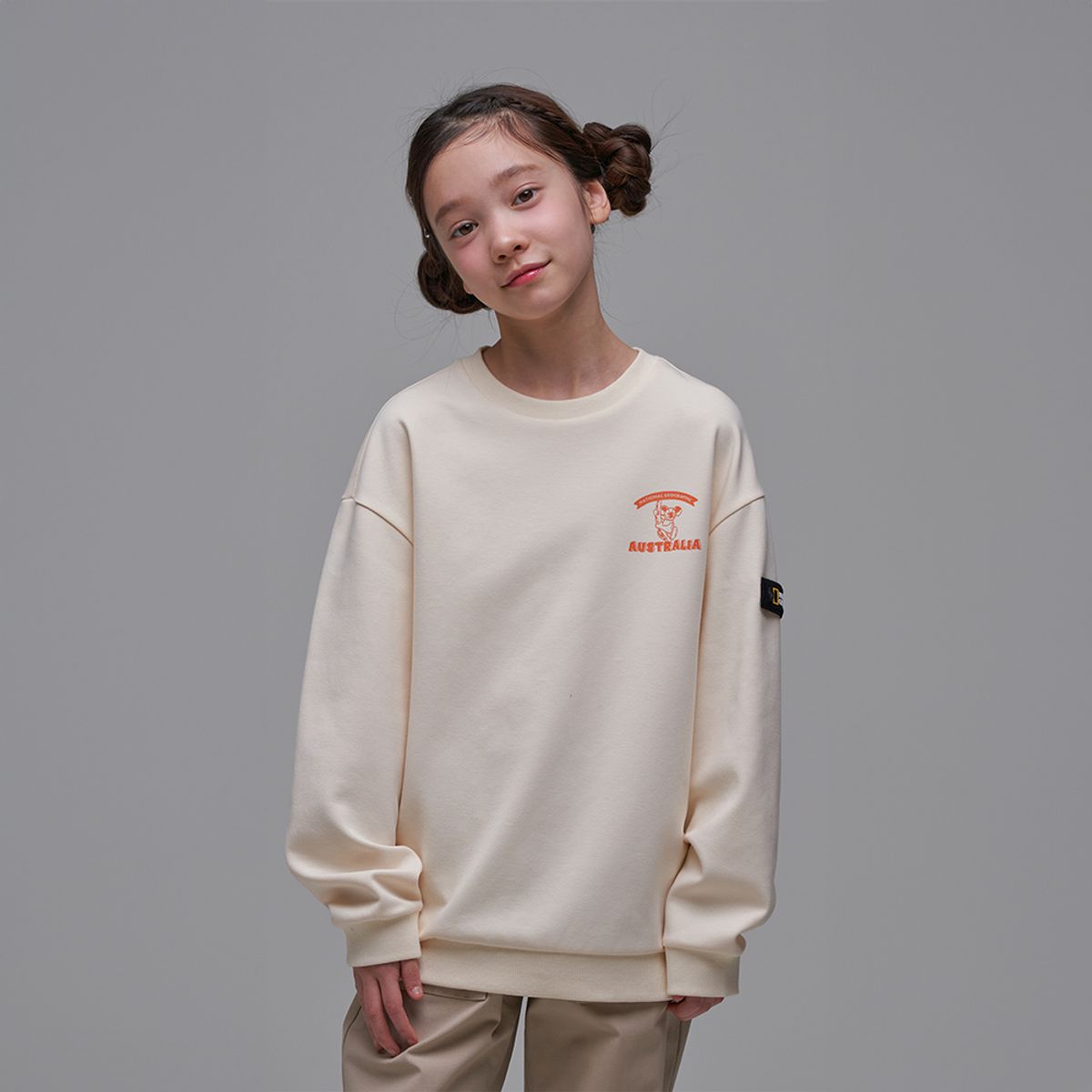 내셔널지오그래픽 키즈(NATIONAL GEOGRAPHIC KIDS) K241USW980 시즌 그래픽 맨투맨-1 CREAM