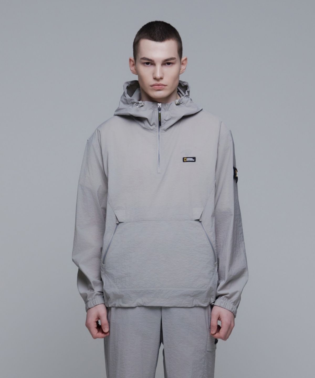 내셔널지오그래픽(NATIONALGEOGRAPHIC) N241UFT940 디머 우븐 트레이닝 후디 아노락 OAK BEIGE