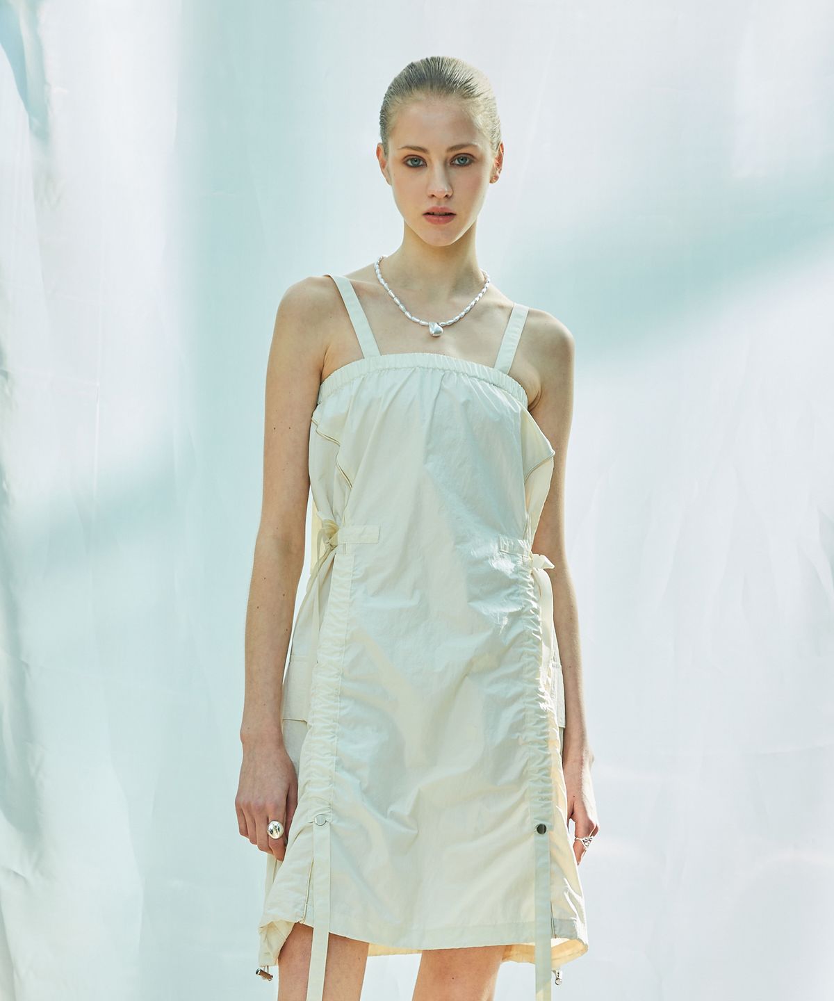 라티젠(LARTIGENT) L9 GLOSSY STRING OPS(CREAM)