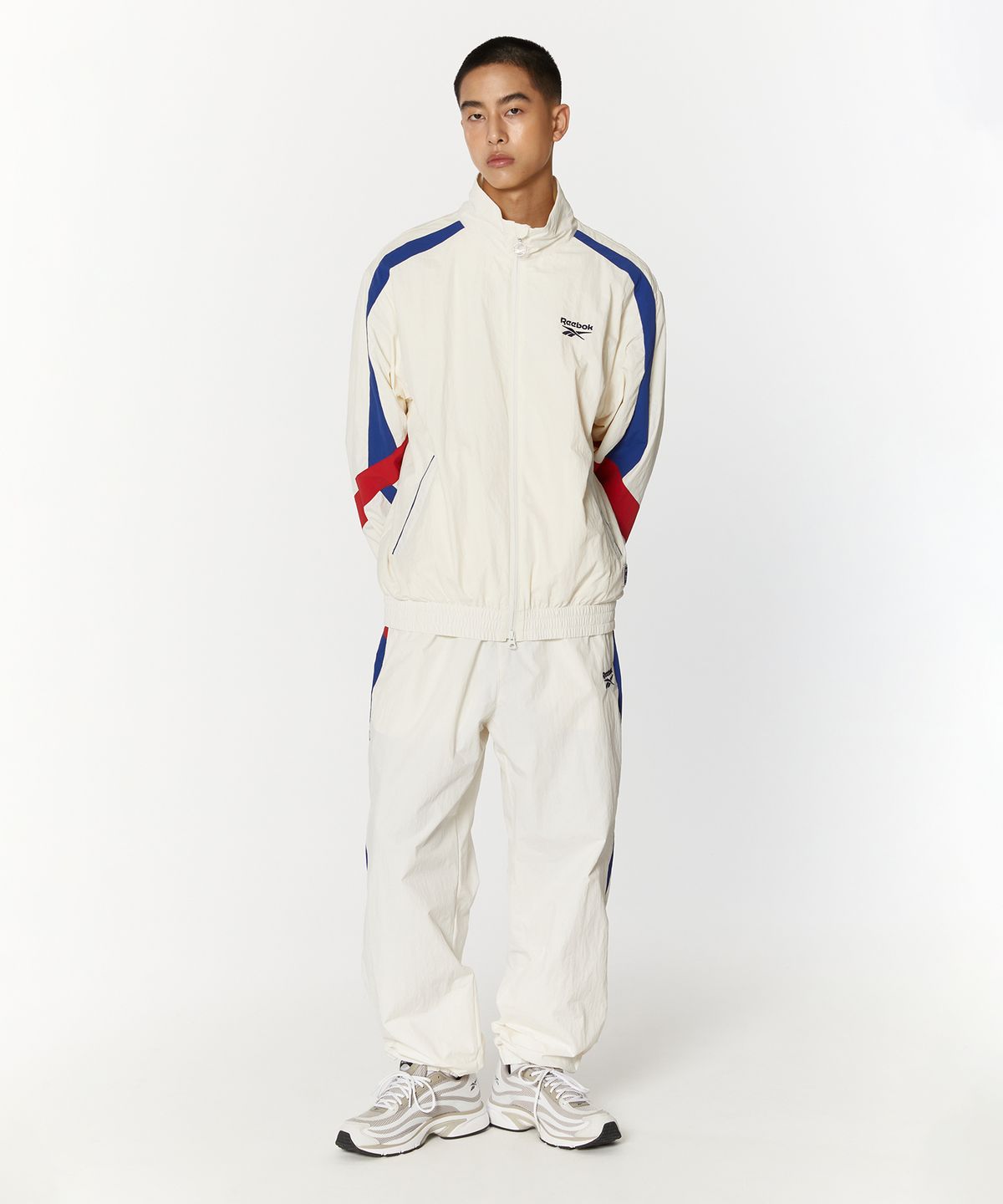 리복(REEBOK) 레전드 웜업 팬츠 - 오프 화이트
