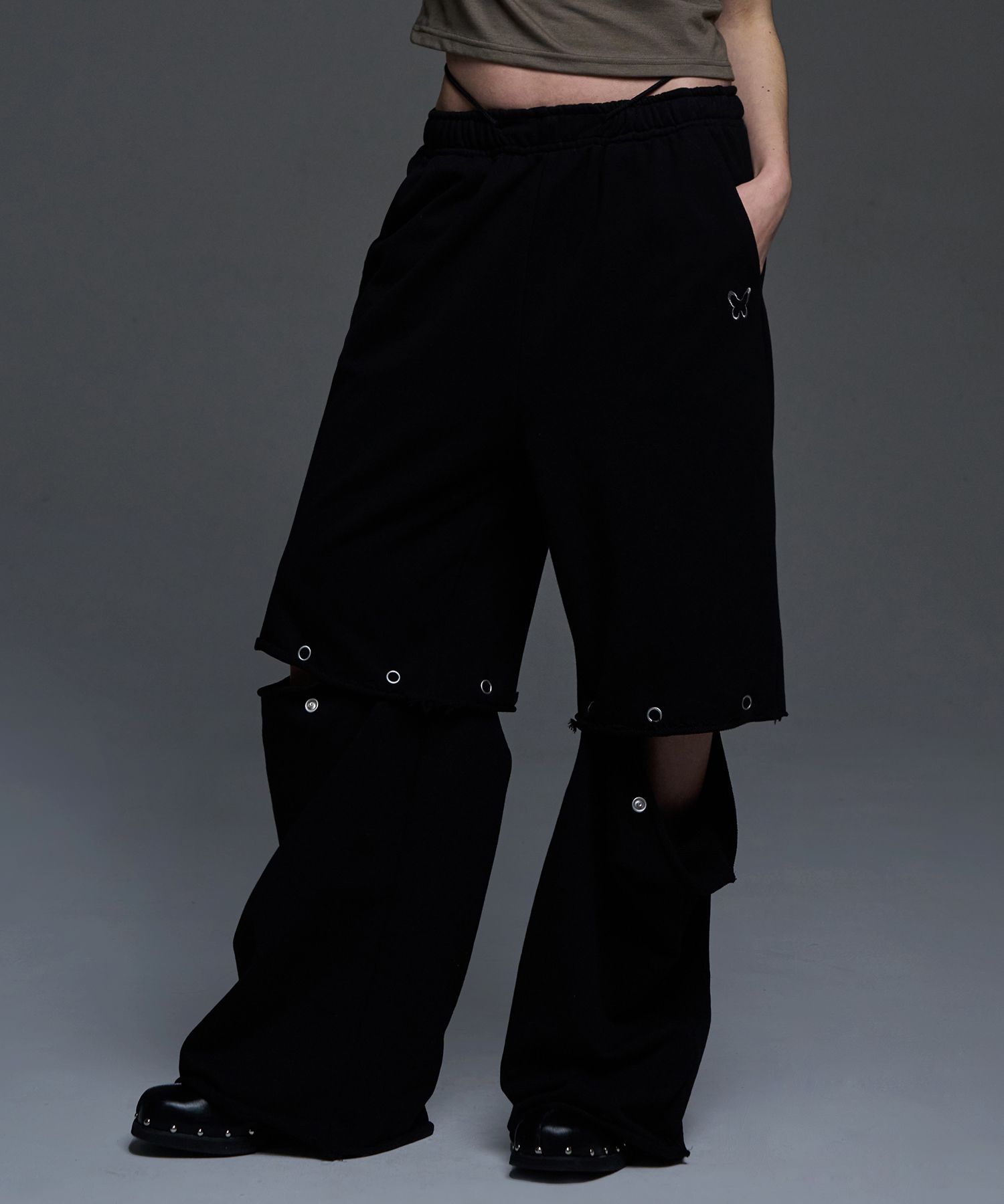 MUSINSA | FANCY CLUB [NF] Two-way punch lettering sweatpants