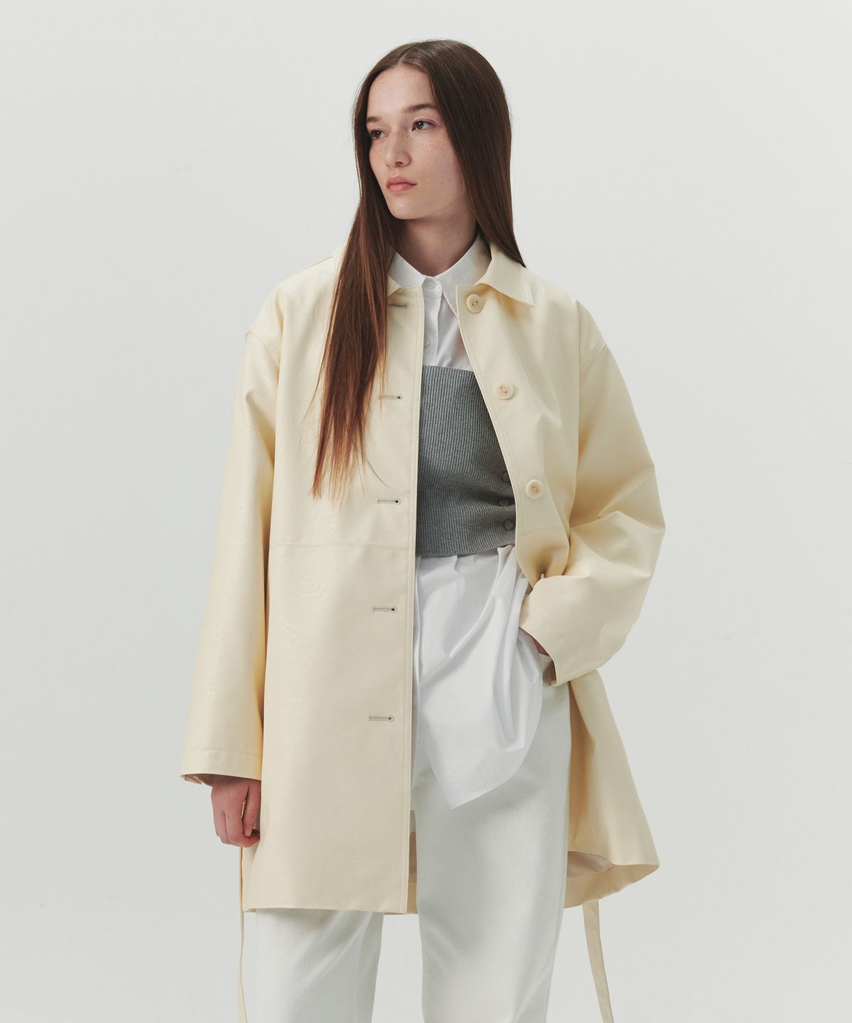 르바(LEVAR) Faux Leather Half Trench Coat - Butter