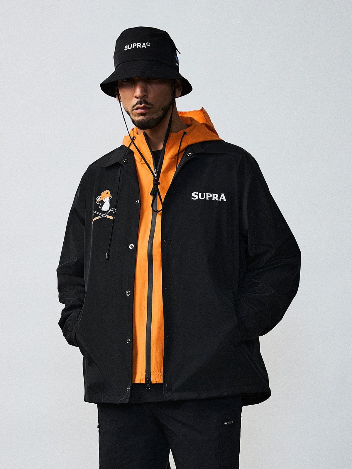 수프라(SUPRA) BAYC 골프 등판 그래픽 우븐 코치자켓(BLACK)