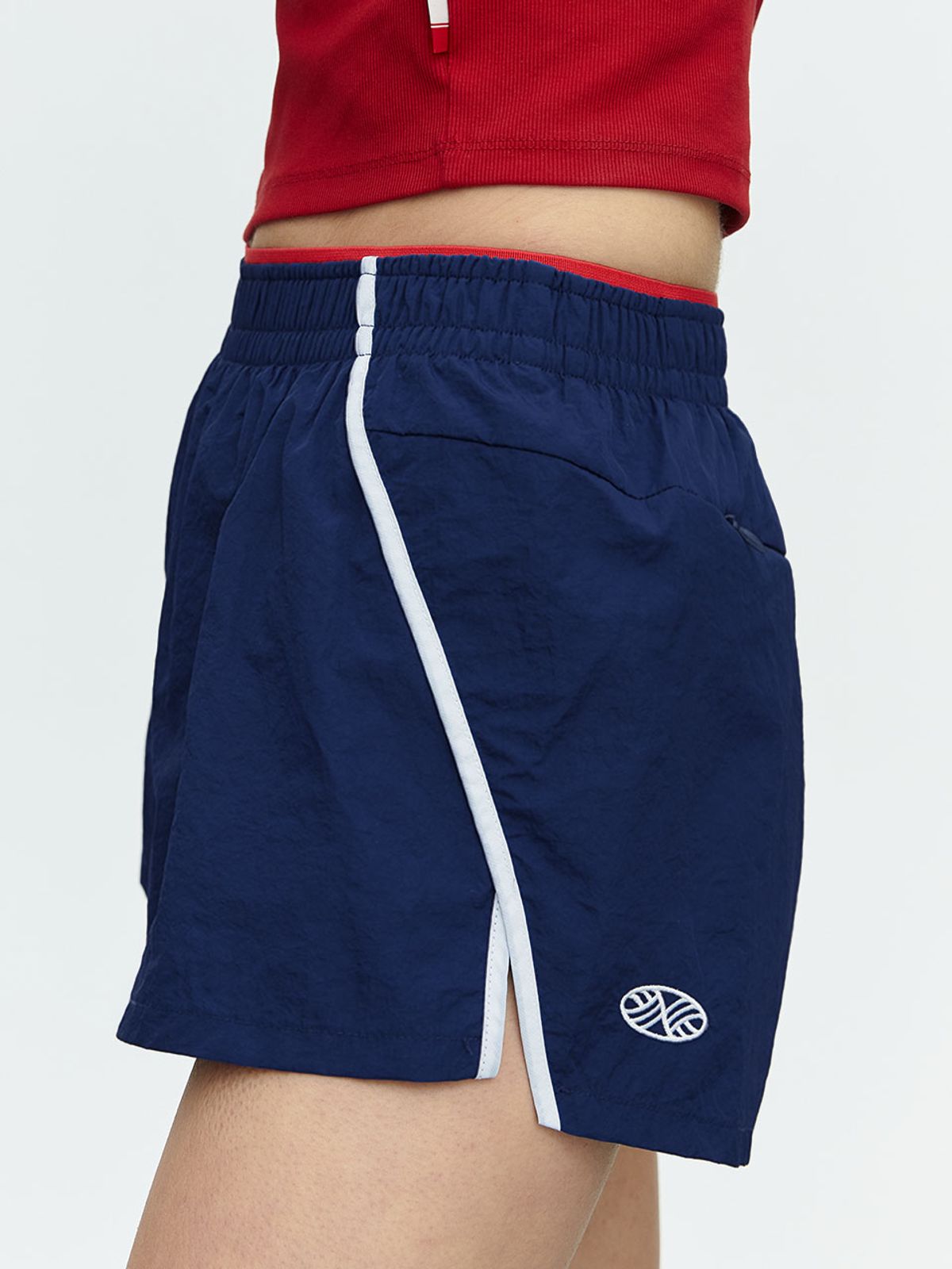 미나수(MENASOO) RUNNING TRACK NYLON SHORTS_NAVY