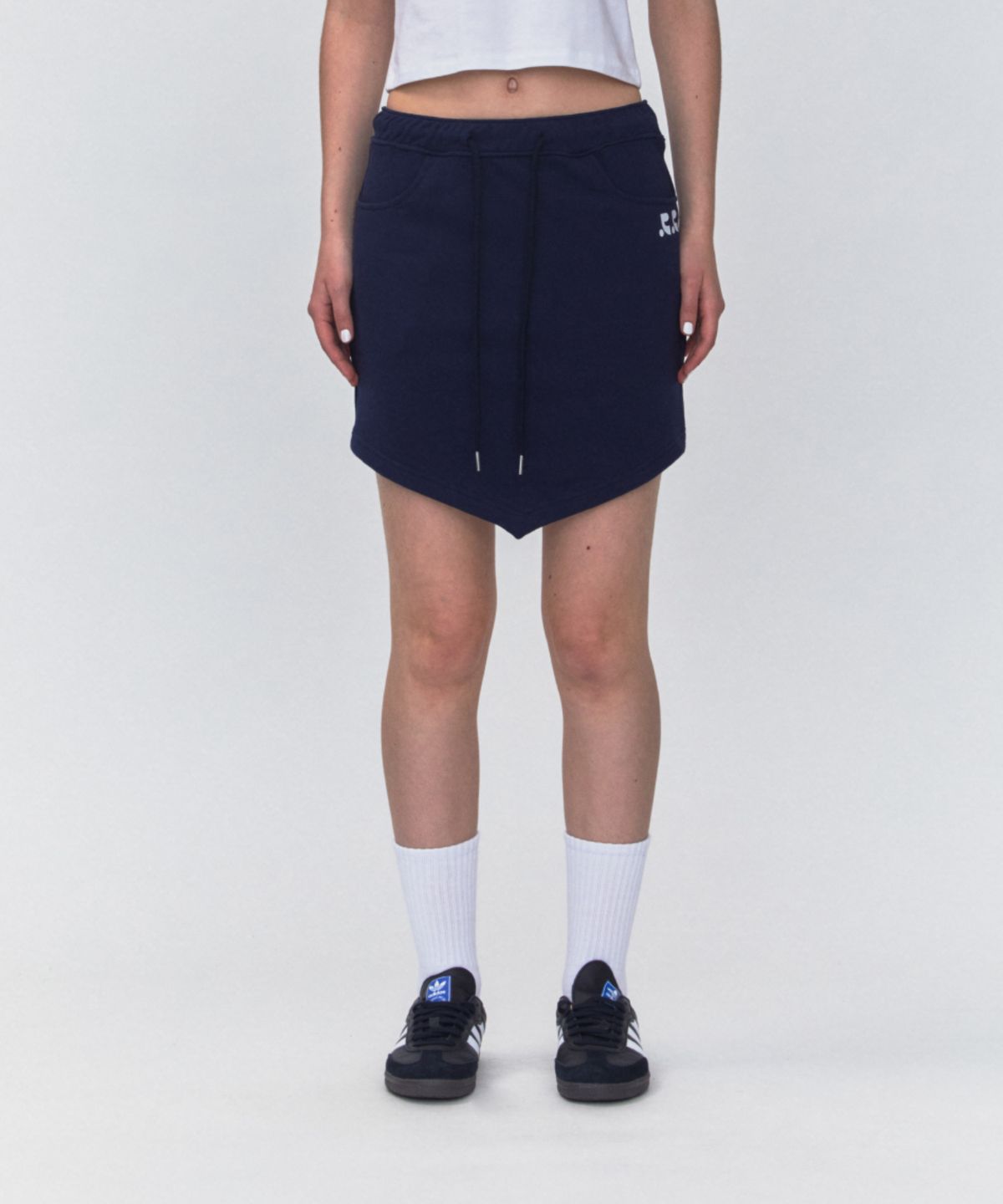 레스트앤레크레이션(REST&RECREATION) RR ARROW POINT SKIRT_NAVY