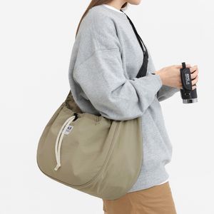 네디아 라운드 스트링 크로스백 - beige