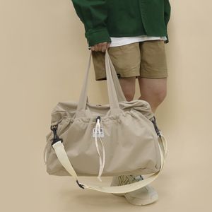 스트링 포켓 보스턴 트래블백 - beige