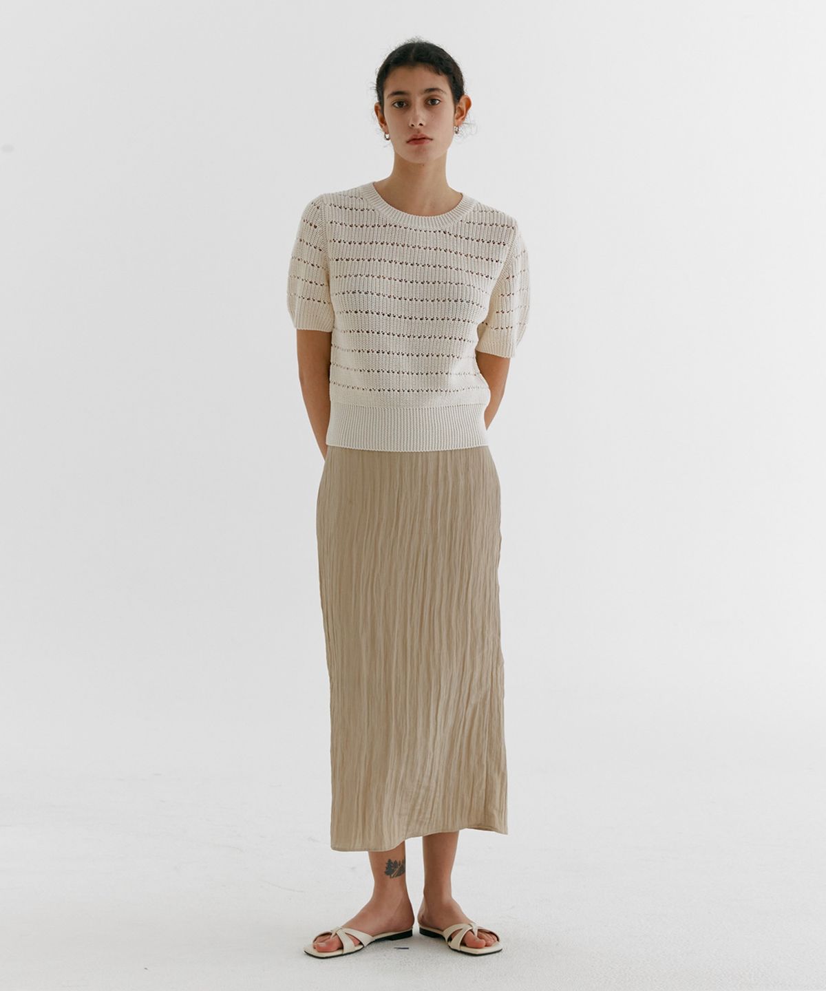 스텝어라운드(STEP AROUND) PLEATS CASUAL SATIN SKIRT_BEIGE