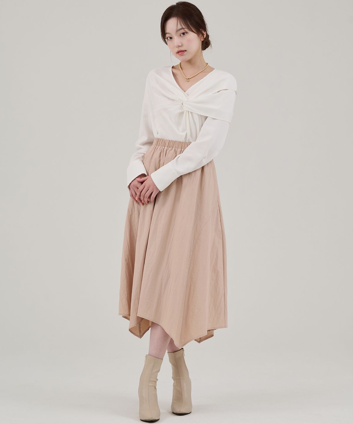 혜영킴(HYEYEONG KIM) 고어드 에이시메트릭 햄 스커트-애프리콧