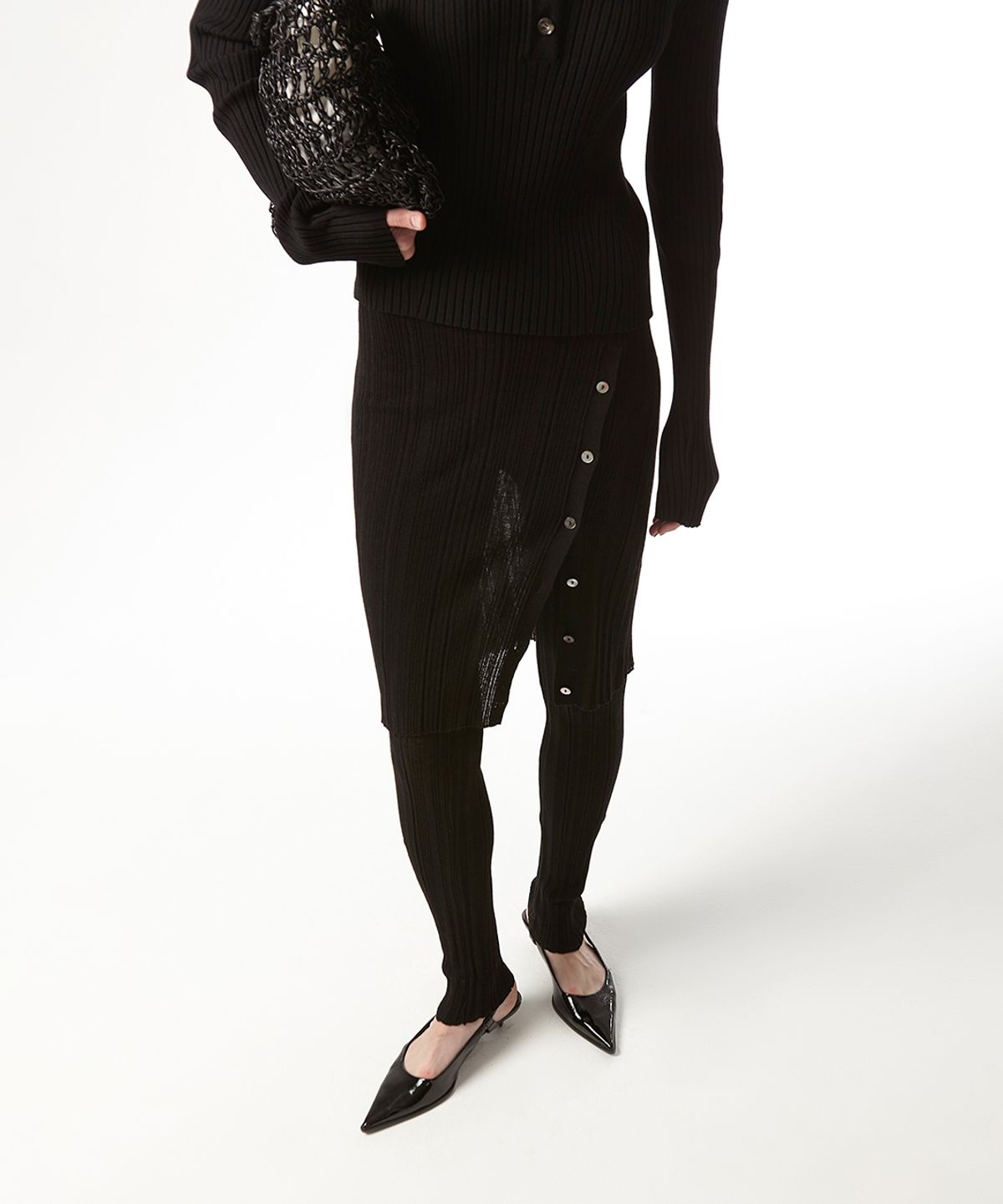 이안조(EAN JO) RIBBED LAYER KNIT LEGGINGS SKIRT(BLACK)