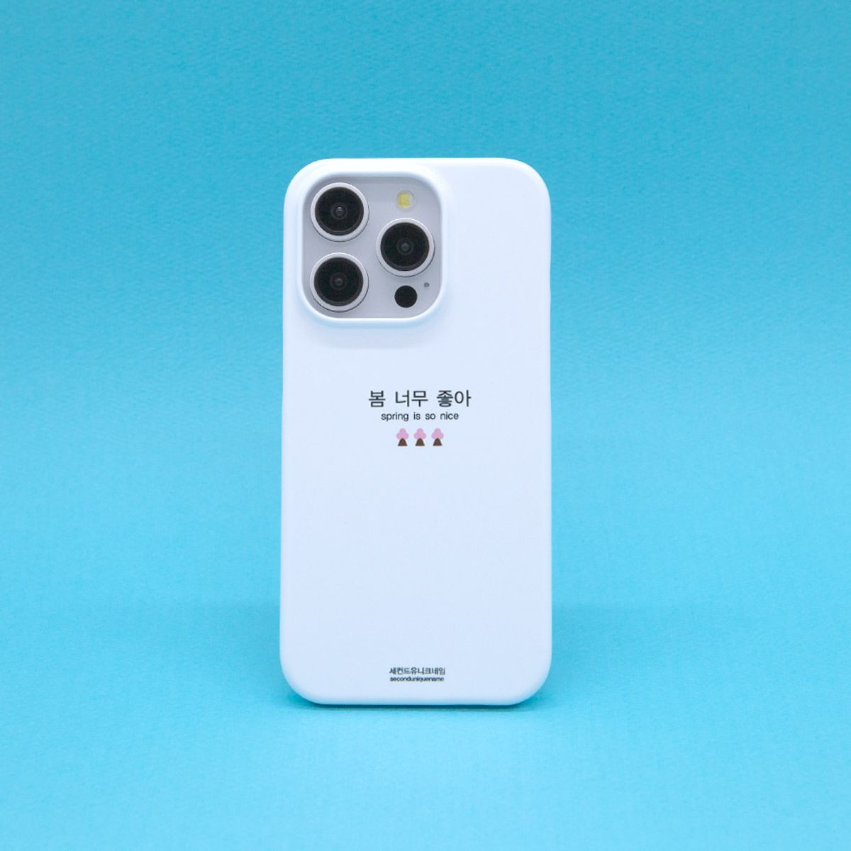 세컨드유니크네임(SECOND UNIQUE NAME) SUN CASE GRAPHIC WORD SPRING