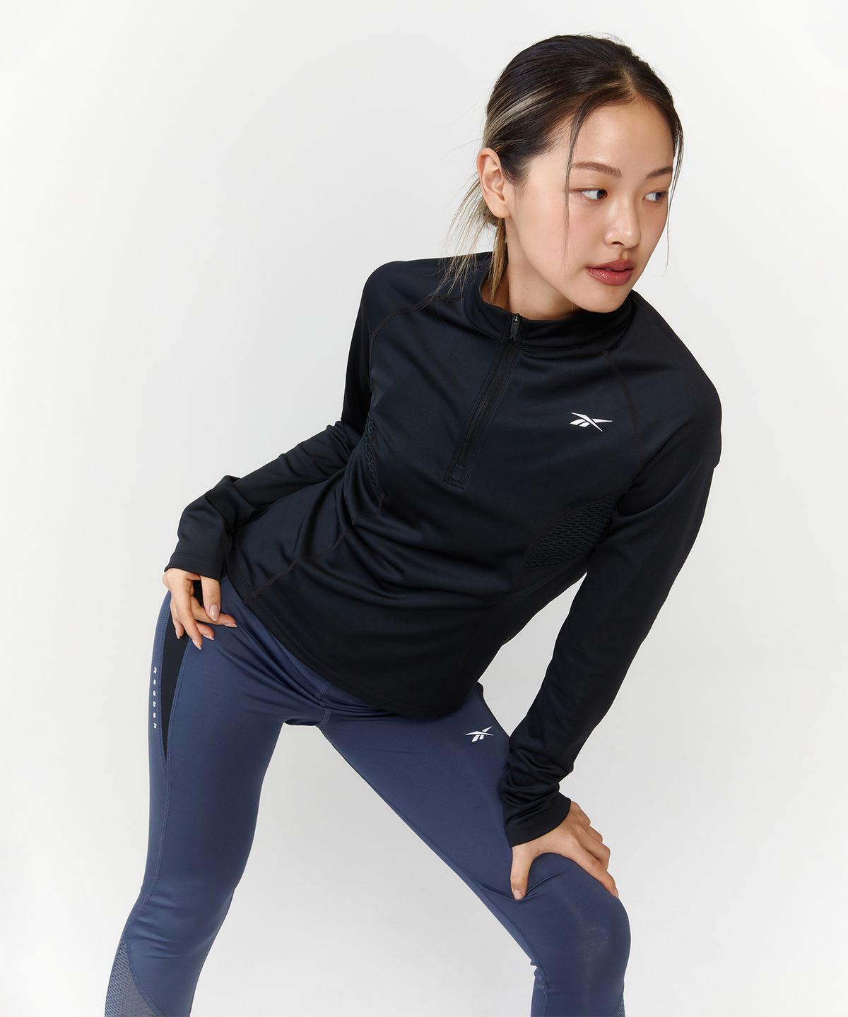 리복(REEBOK) 러닝 하프 집업 티셔츠 (W) - 블랙 / 100075413
