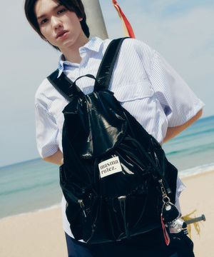 String flap backpack _ Glittery black