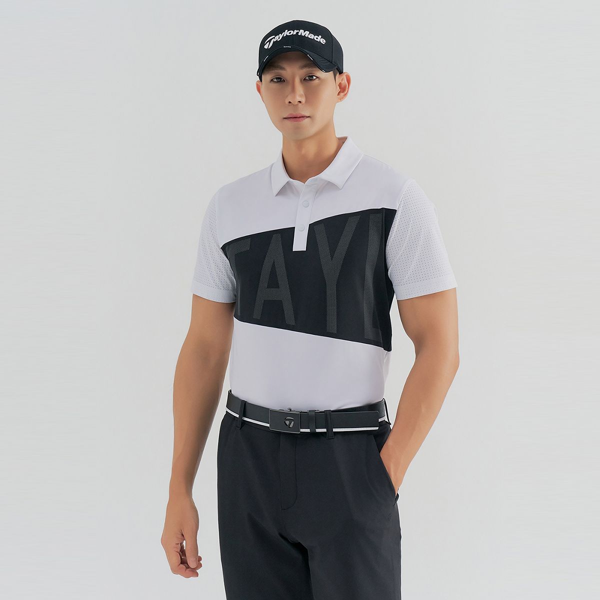 테일러메이드 어패럴(TAYLORMADE APPAREL) 남성 빅레터링 블록 타공 카라 반팔 티셔츠 T8031TN2243-100
