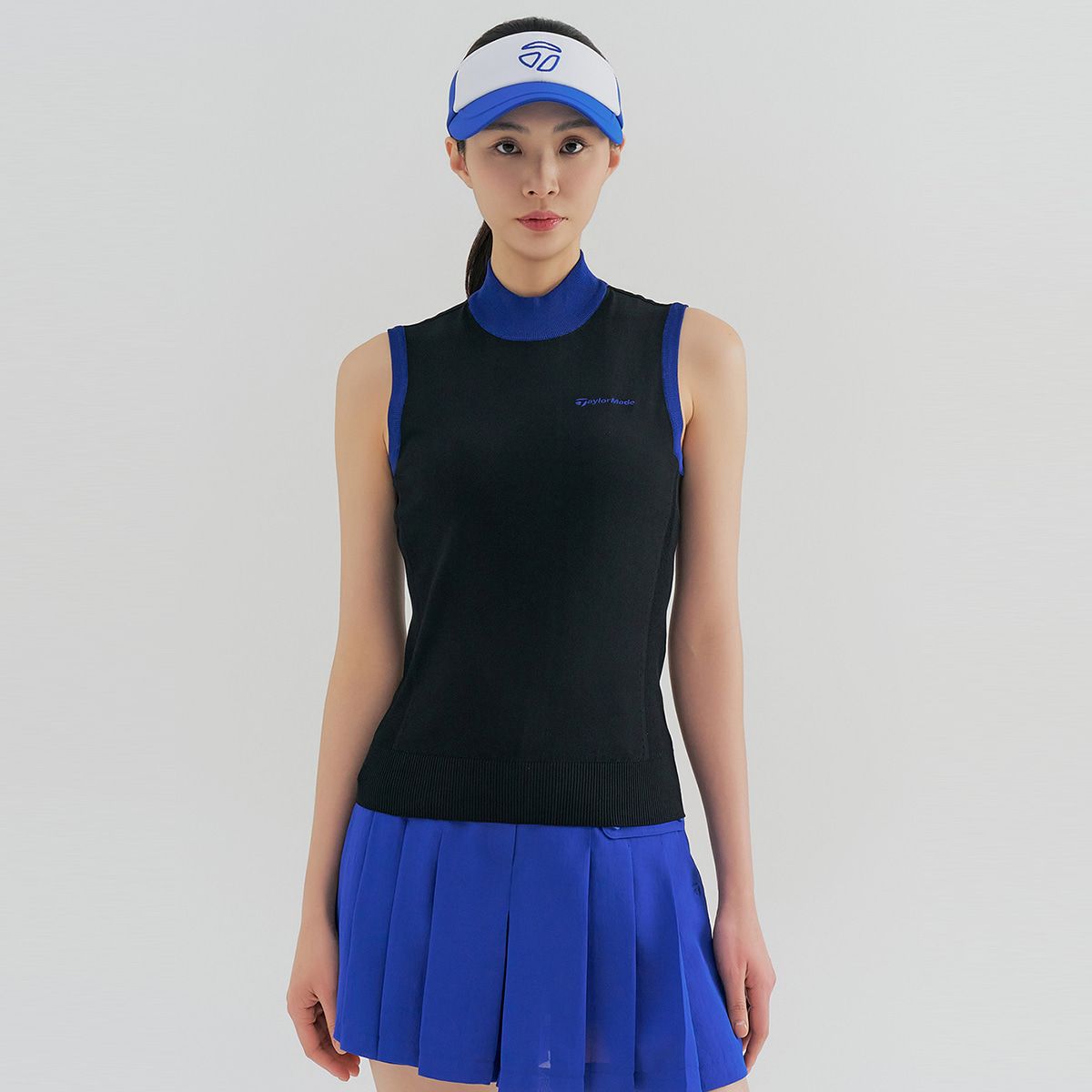테일러메이드 어패럴(TAYLORMADE APPAREL) 여성 하이넥 슬리브리스 니트 TSN-62HG23-199