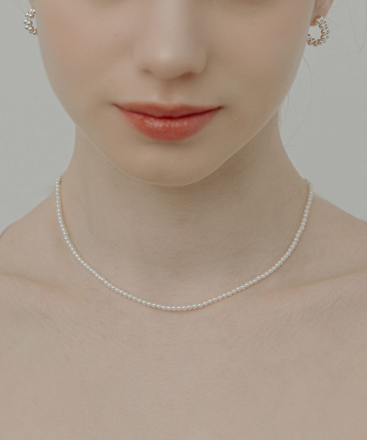 티오유(TOU) WE014 Mini pearl necklace