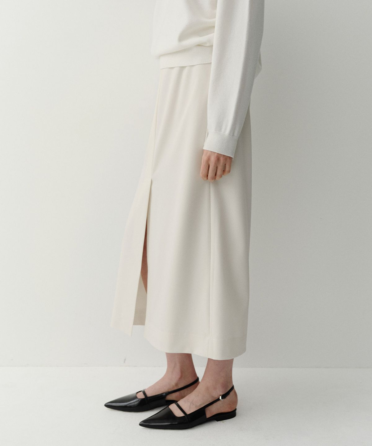 이아(EAAH) LONG SLIT SKIRT (CREAM)