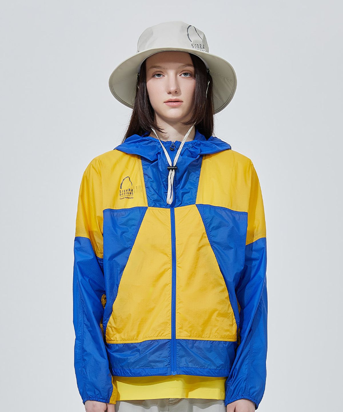 시에라디자인(SIERRA DESIGNS) W) 그랜드마더십(GRAND MOTHERSHIP) 초경량 윈드 자켓 YELLOW / BLUE
