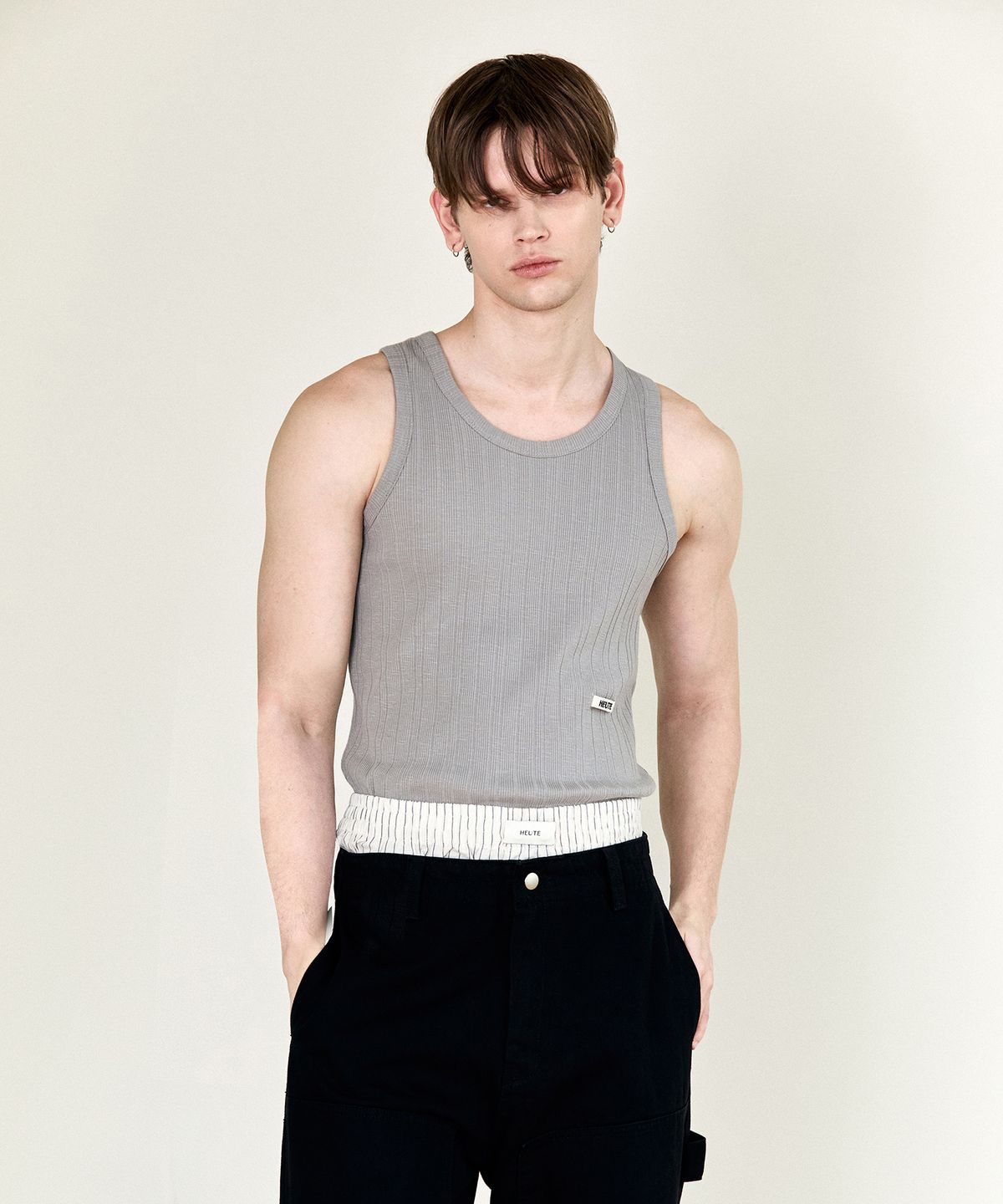 호이테(HEUTE) HET RIBBED SLEVELESS TOP (GREY)