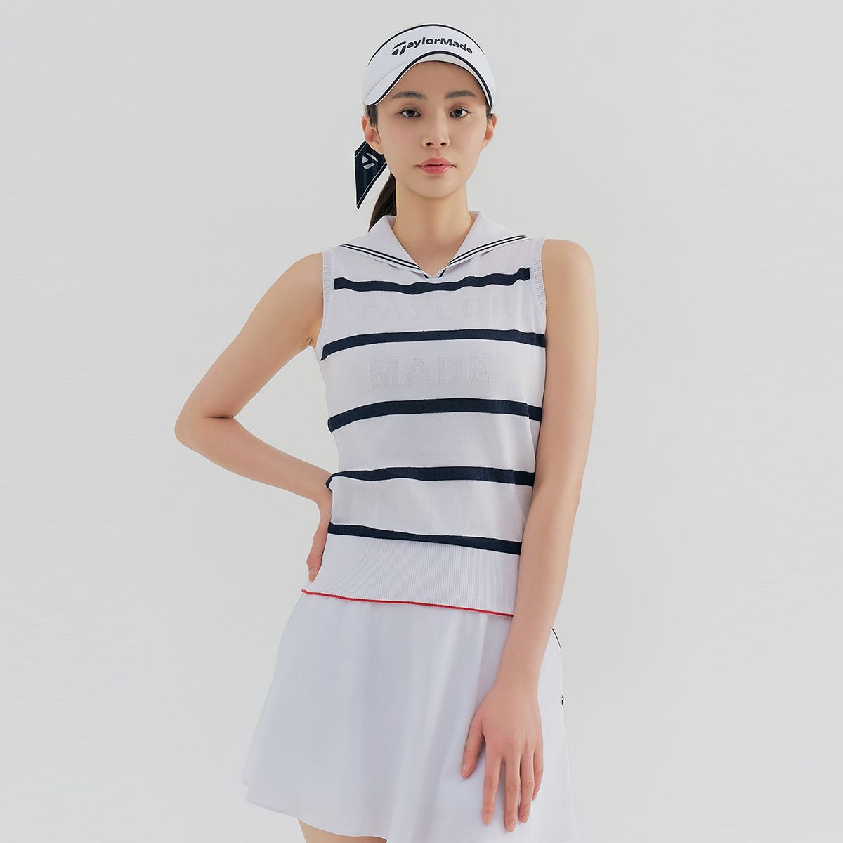 테일러메이드 어패럴(TAYLORMADE APPAREL) 여성 넥변형 슬리브리스 니트 T8031SN6222-915