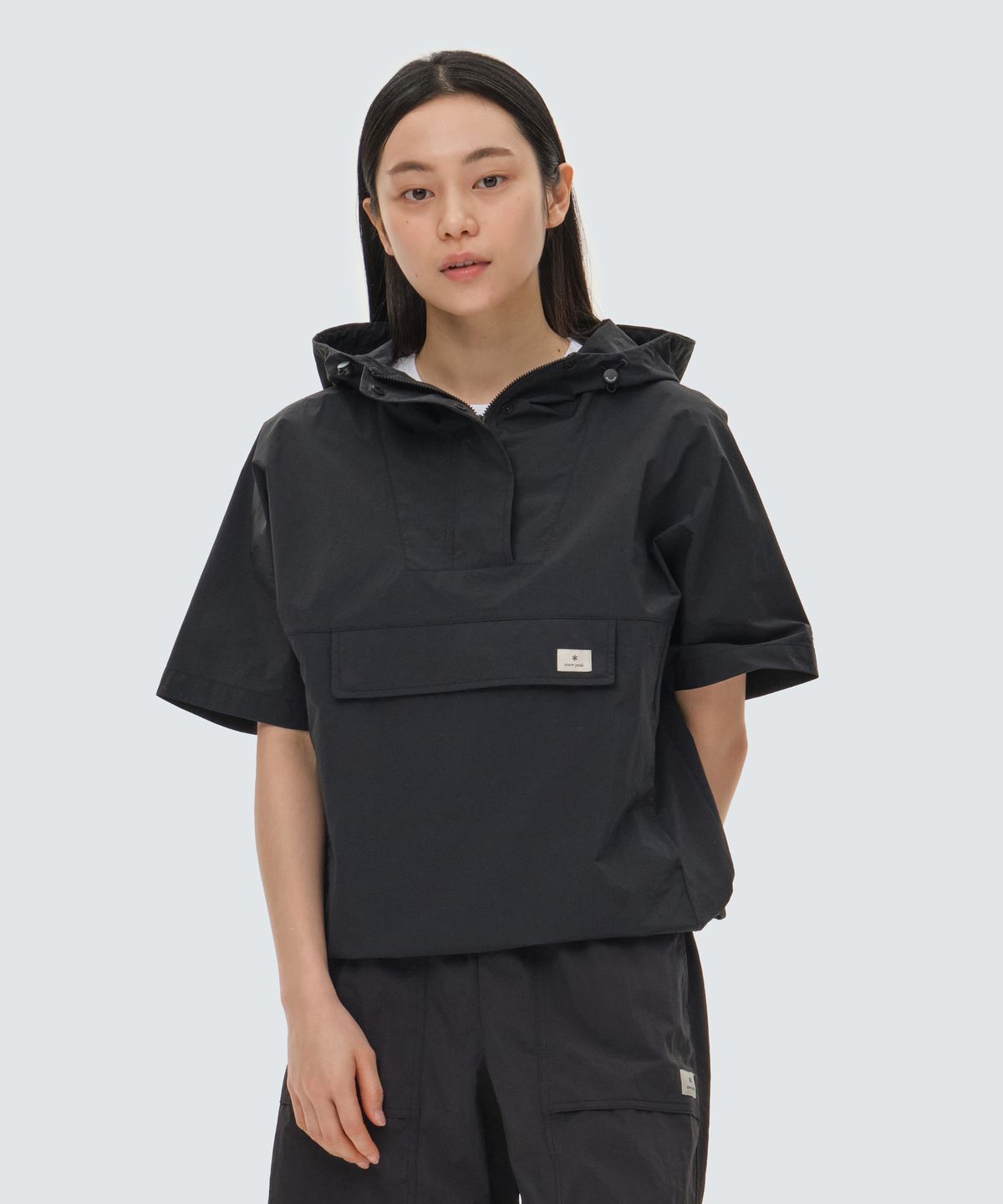스노우피크 어패럴(SNOWPEAK APPAREL) 타슬란 여성 우븐 반팔 아노락 Black (S24MWLAN51)