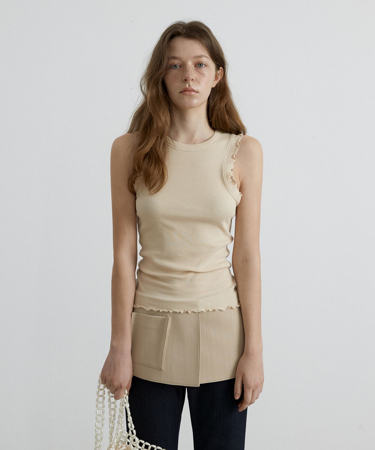 오버듀플레어(OVERDUEFLAIR) WAVE RIBBED SLEEVELESS_LIGHT BEIGE