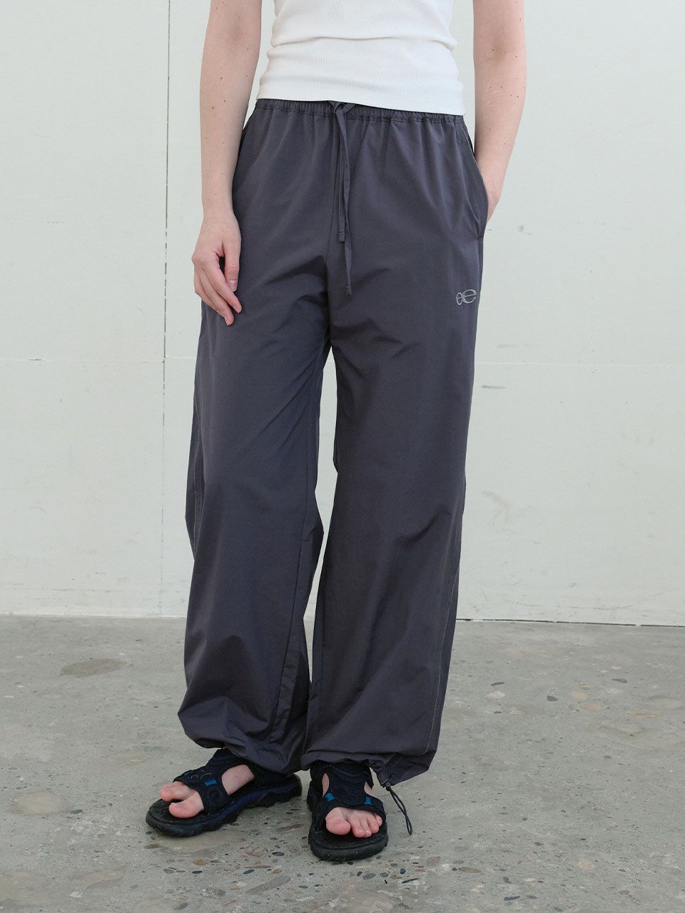 MUSINSA | ENZO BLUES Two-Way Track Pants (Charcoal)