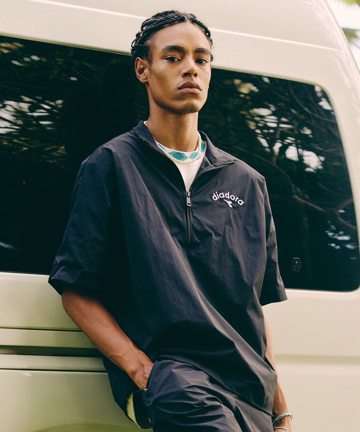 디아도라(diadora) 컴피 우븐 반팔 아노락 BLACK