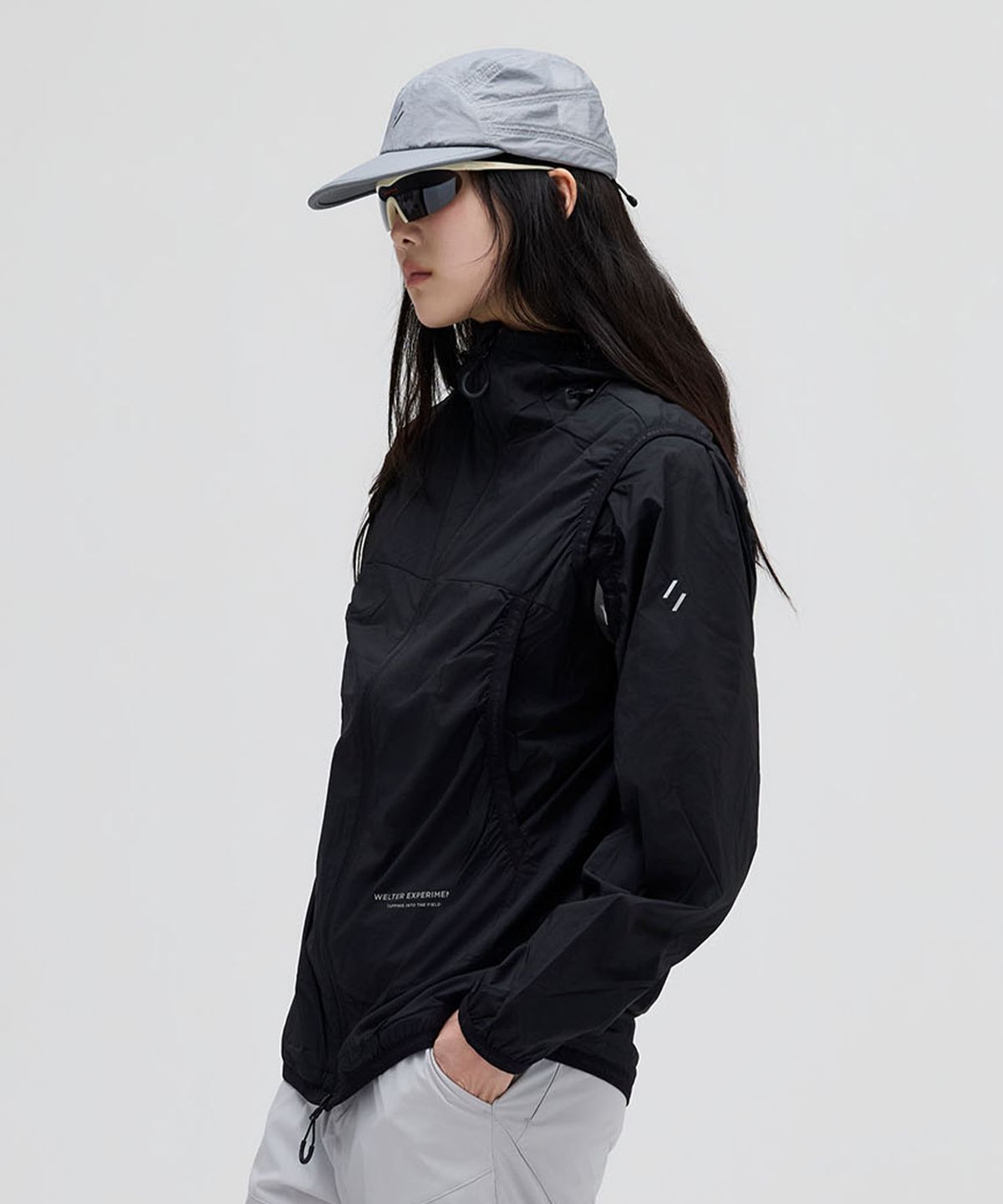 웰터 익스페리먼트(WELTER EXPERIMENT) DETACHABLE LIGHT WINDBREAKER_BLACK_WOL061