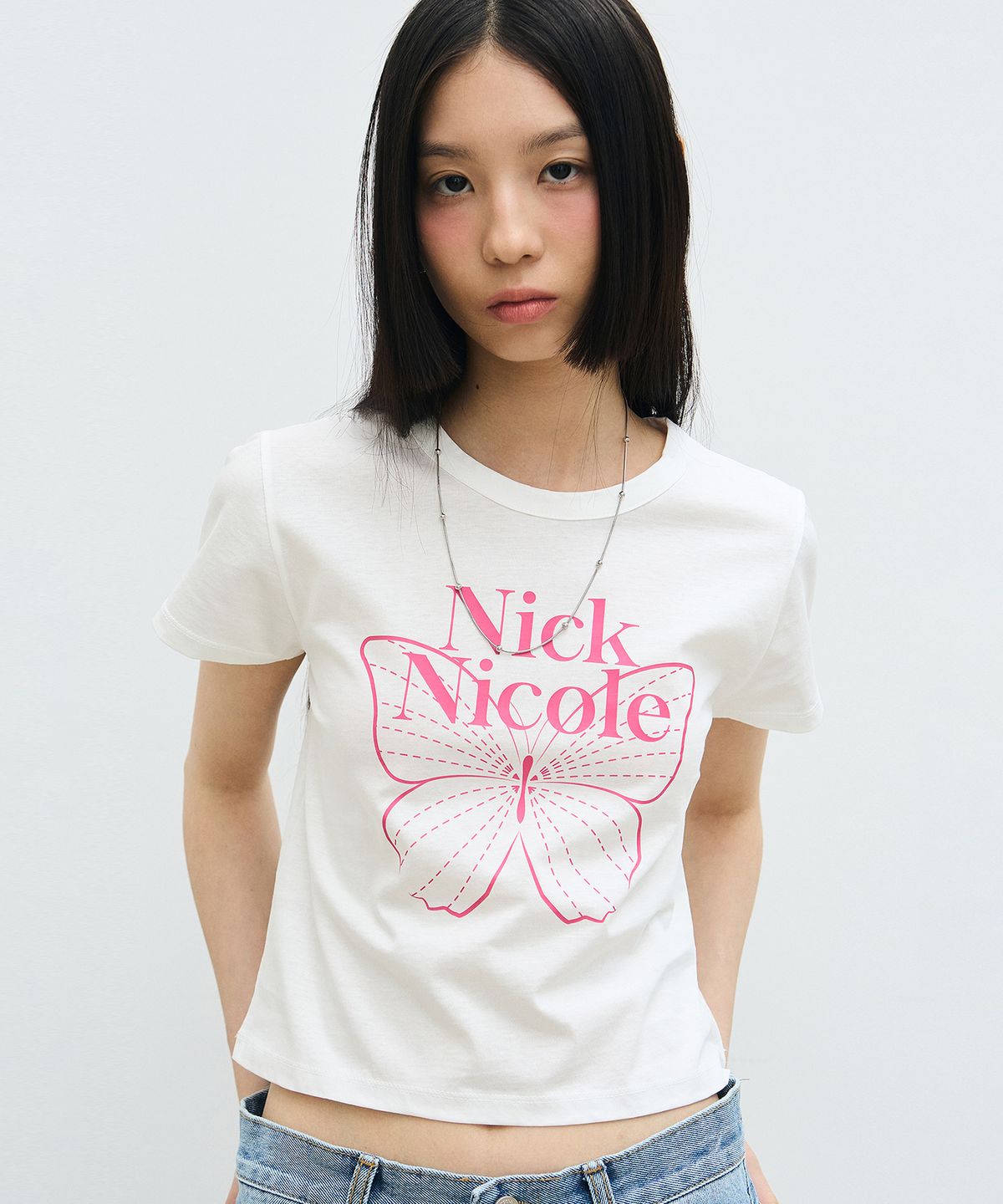 닉앤니콜(NICK&NICOLE) BUTTERFLY SIGNATURE CROP TOP_WHITE PINK
