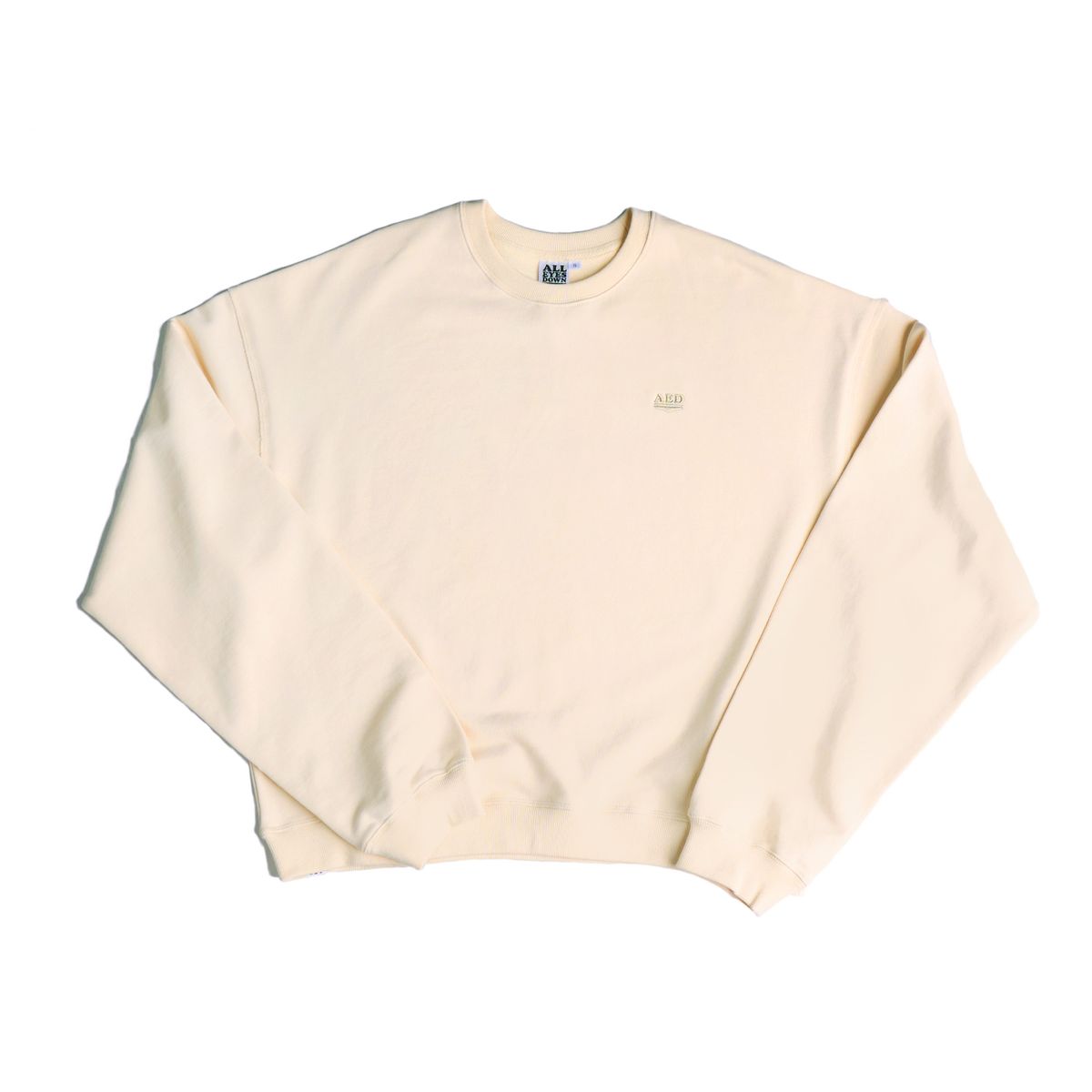 올아이즈다운(ALL EYES DOWN) LOGO EMBLEM SWEATSHIRT (IVORY)